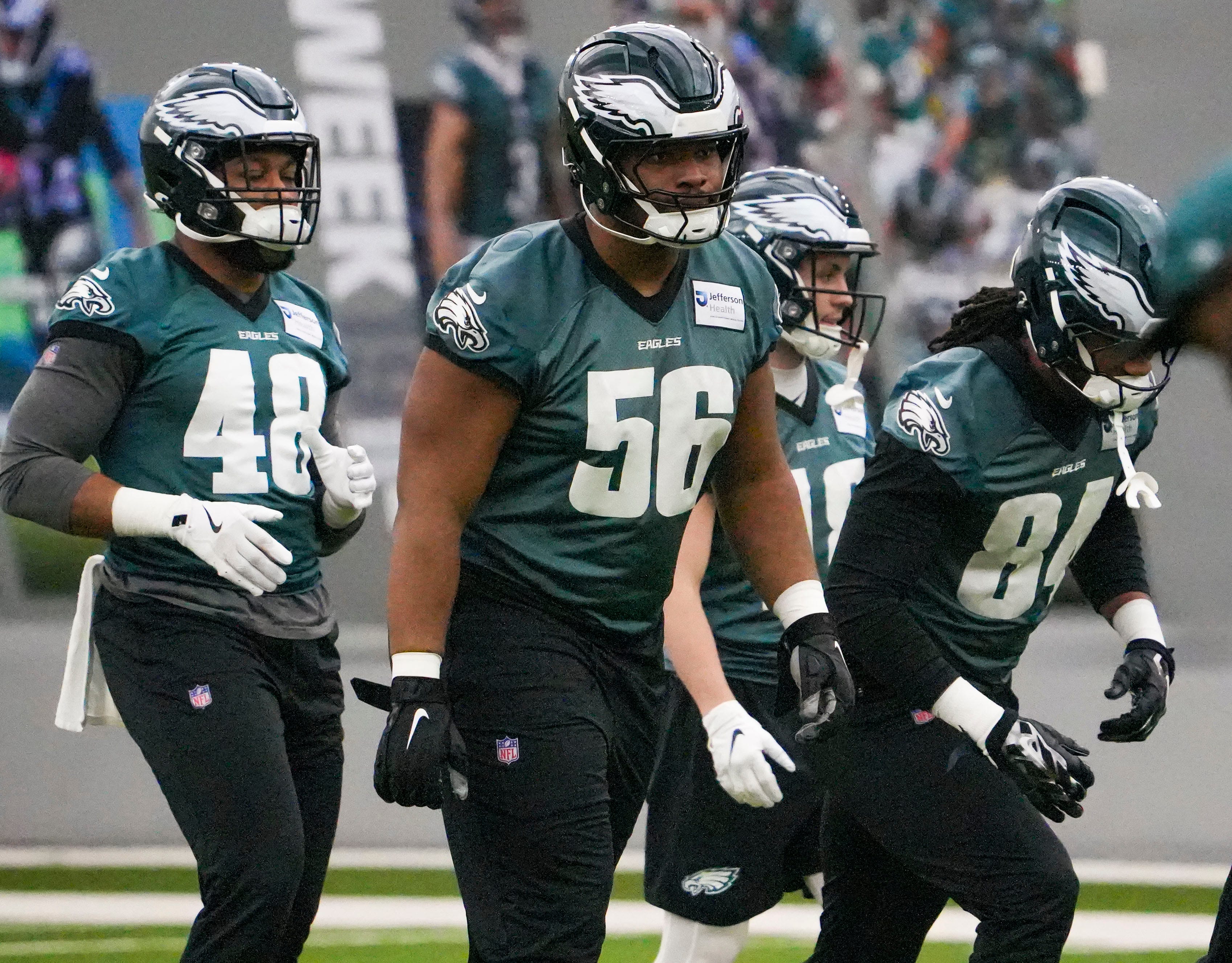 Eagles offensive lineman Tyler Steen (56) joins other members of the offense in warmups as the Philadelphia Eagles work out in preparation for the Super Bowl at the NovaCare Complex in Philadelphia.