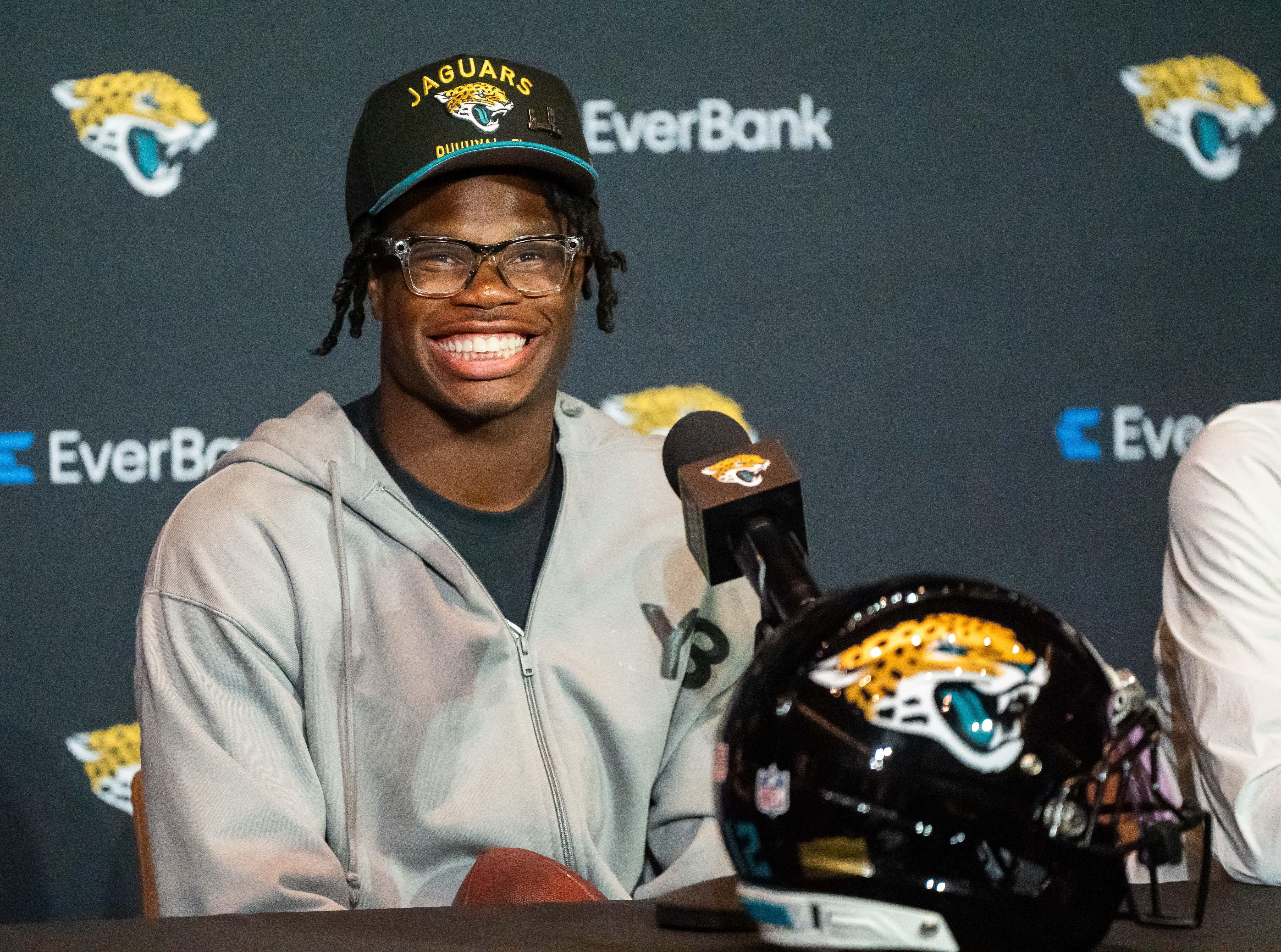 The Jacksonville Jaguars’ first-round pick, Colorado Buffaloes wide receiver and defensive back Travis Hunter, flashes his wide smile during a press conference Friday, March 25, 2025 at Miller Electric Center in Jacksonville, Fla.