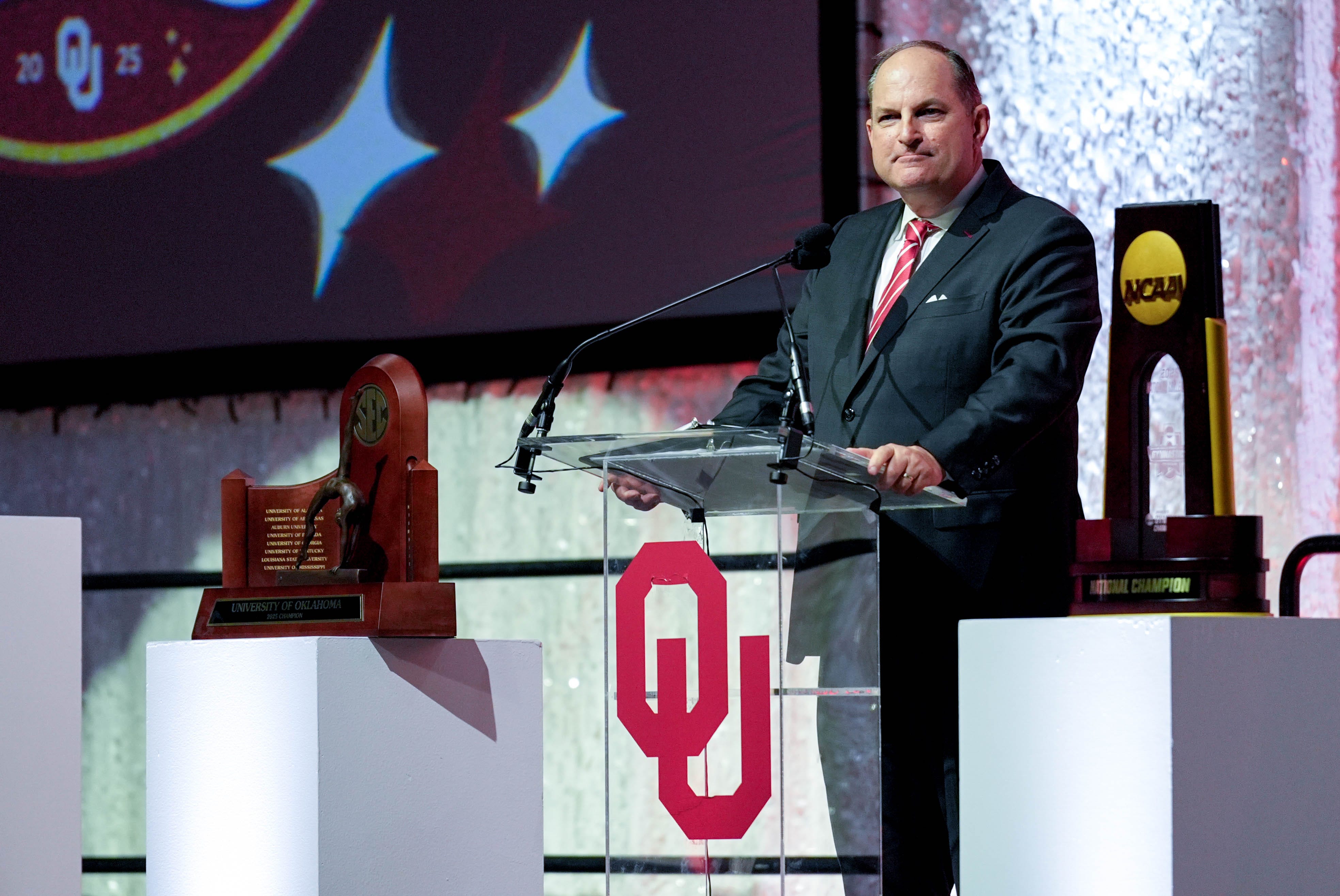 Athletic director Joe Castiglione speaks during an NCAA championship rally for OU gymnastics in Norman, Okla., Monday, April 28, 2025.