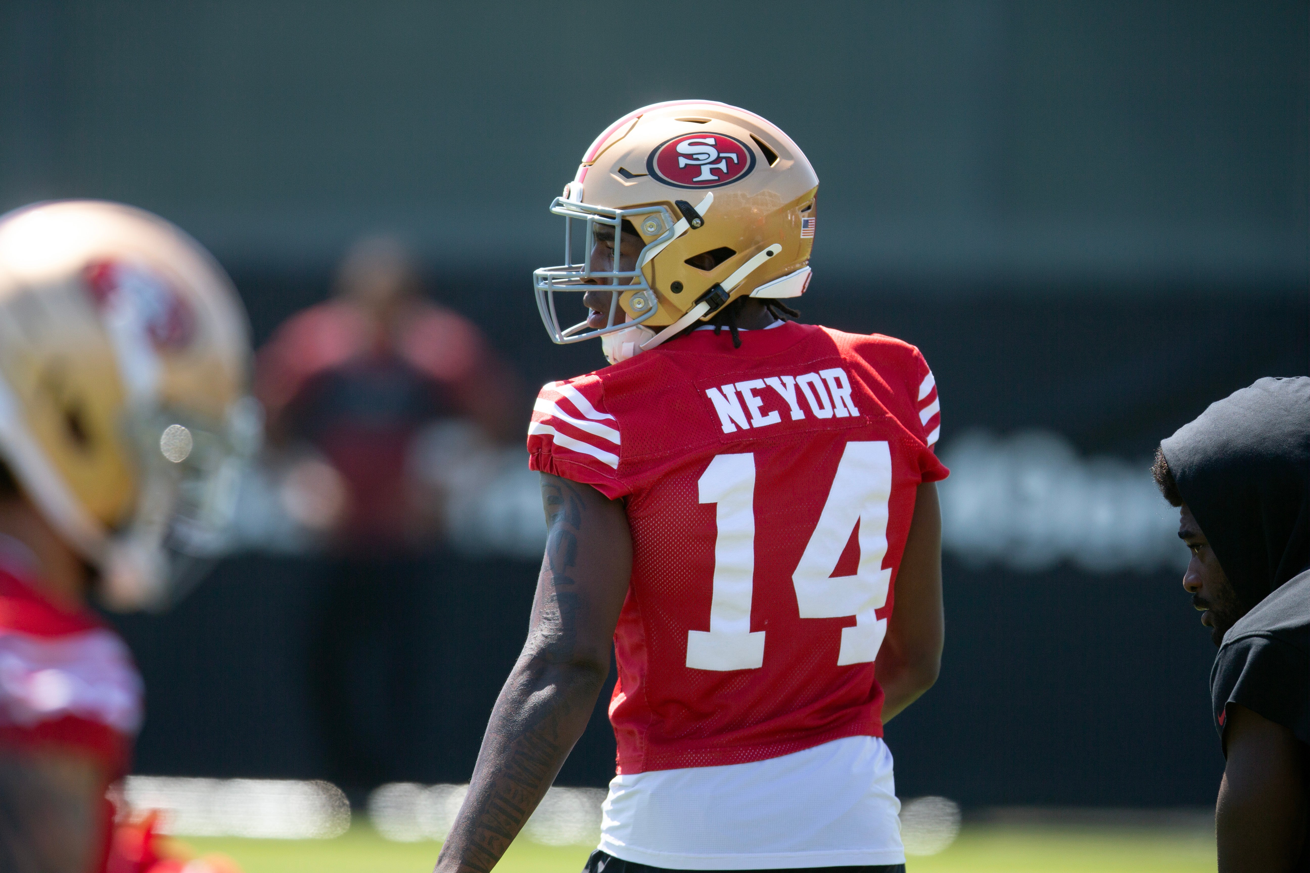San Francisco 49ers wide receiver Isaiah Neyor (14) awaits his turn in passing drills during an OTA at Levi's Stadium.