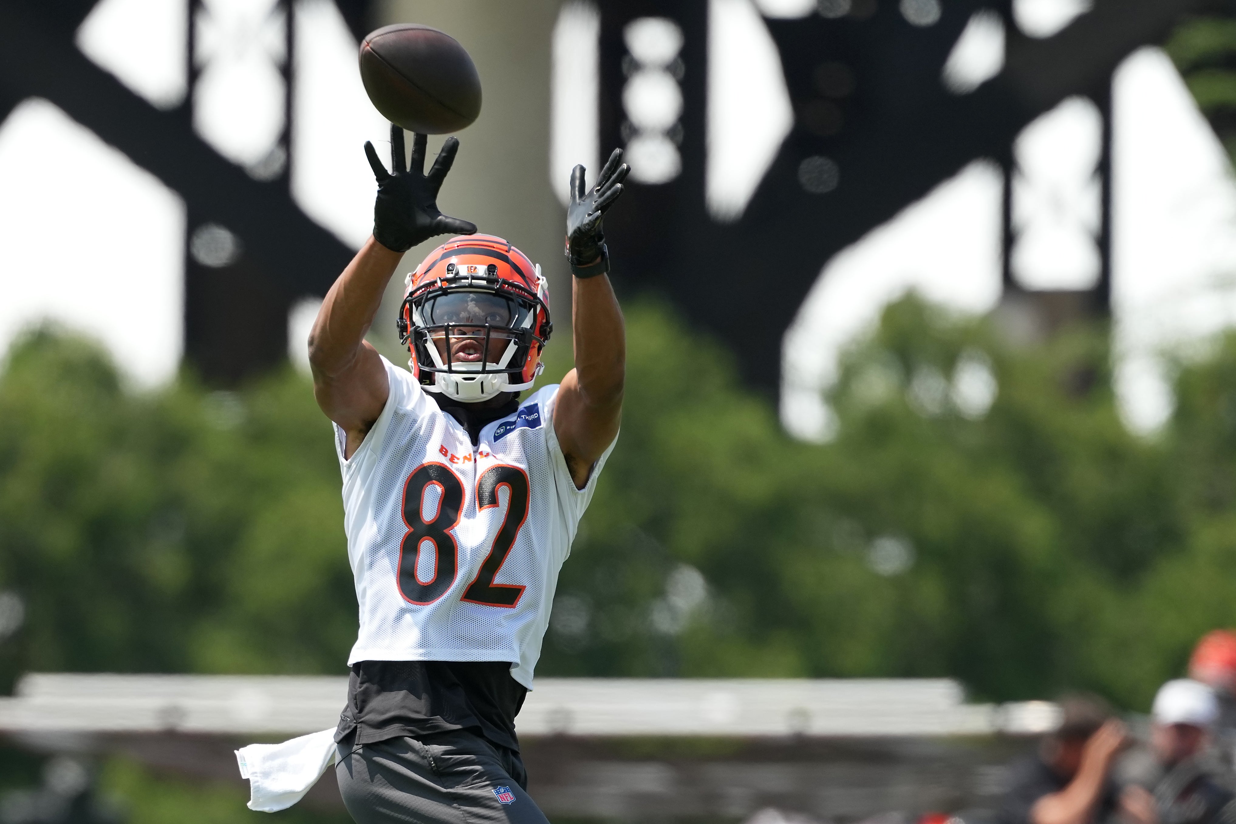 Jun 10, 2025; Cincinnati, OH, USA; Cincinnati Bengals wide receiver Mitchell Tinsley (82) completes a catch during practice at Paycor Stadium.