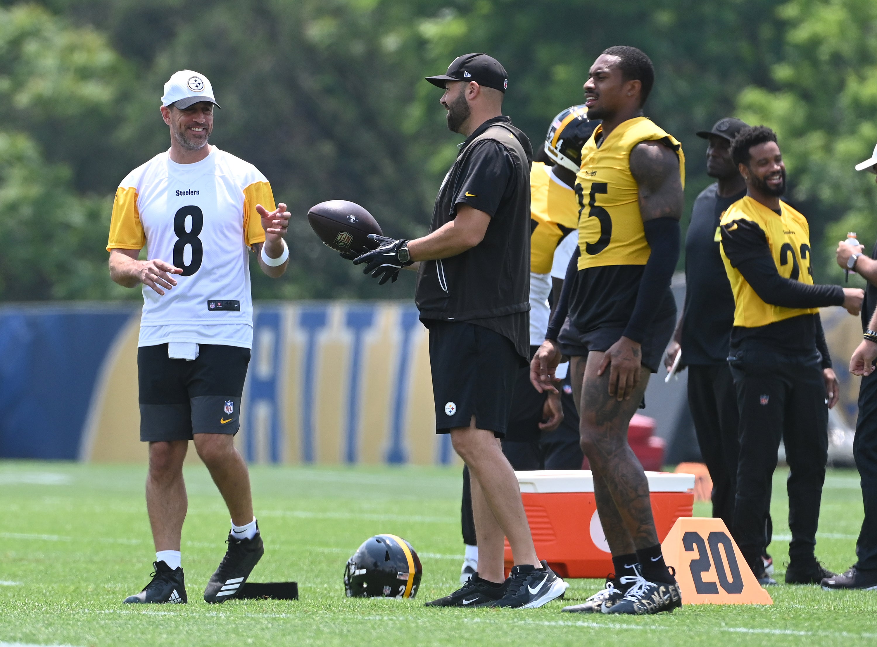 Jun 10, 2025; Pittsburgh, PA, USA; Pittsburgh Steelers quarterback Aaron Rodgers (8) gets the ball during minicamp at their South Side facility.