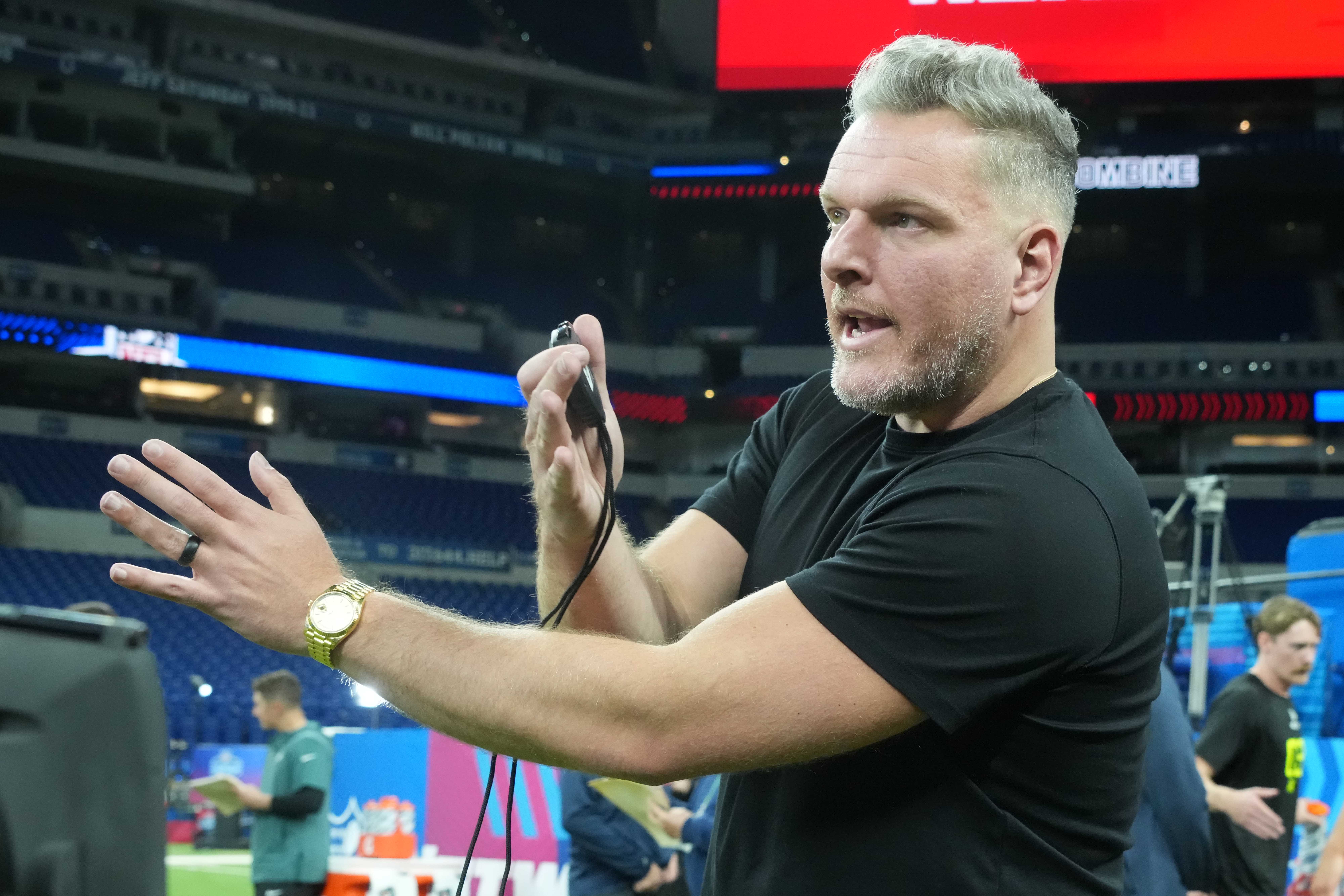 Feb 27, 2025; Indianapolis, IN, USA; Pat McAfee watches workouts at the 2025 NFL Scouting Combine at Lucas Oil Stadium.