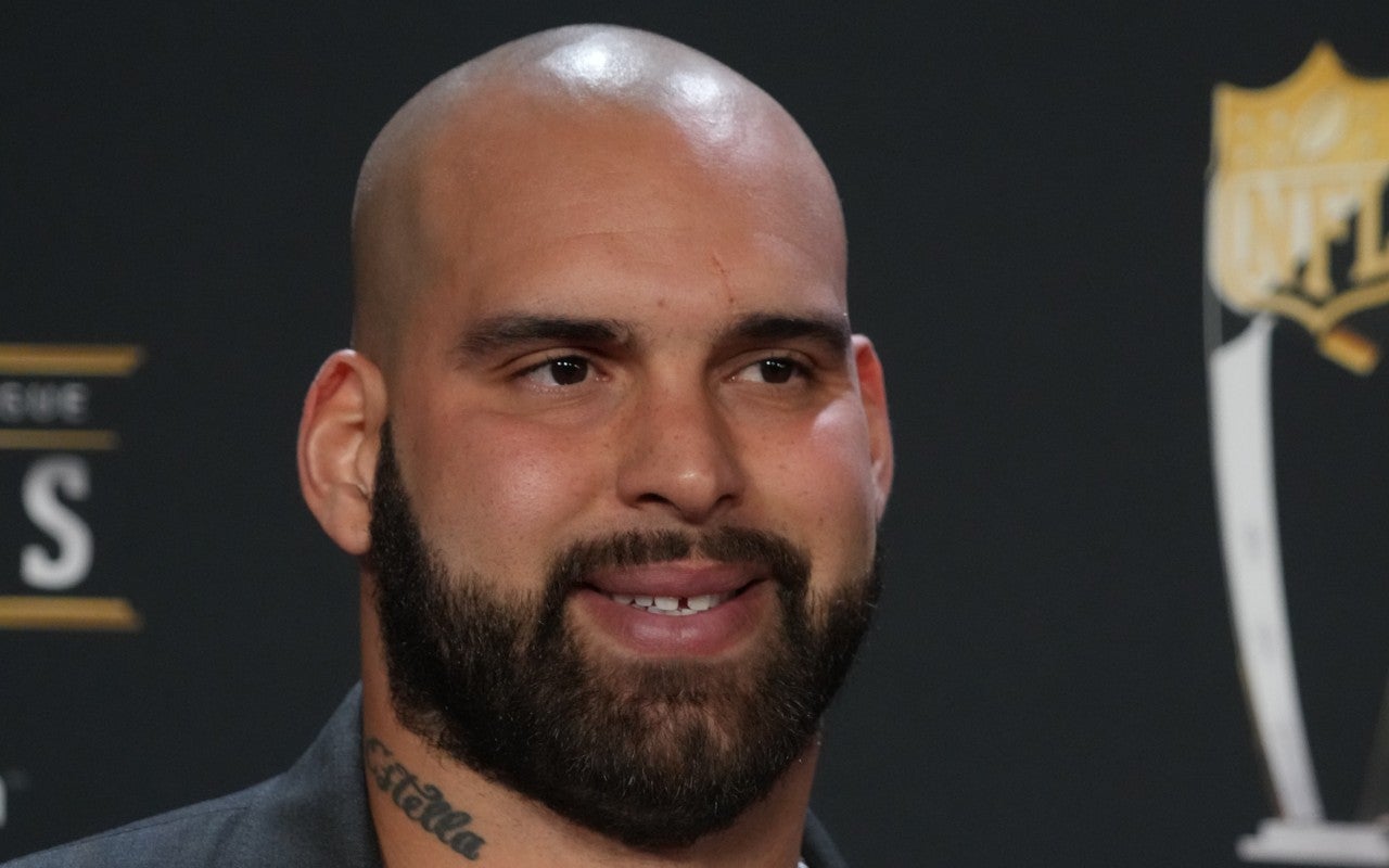 Feb 9, 2023; Phoenix, Arizona, US; Patriots defensive end and Walter Payton man of the year Lawrence Guy poses for a photo on the red carpet before the NFL Honors award show at Symphony Hall.
