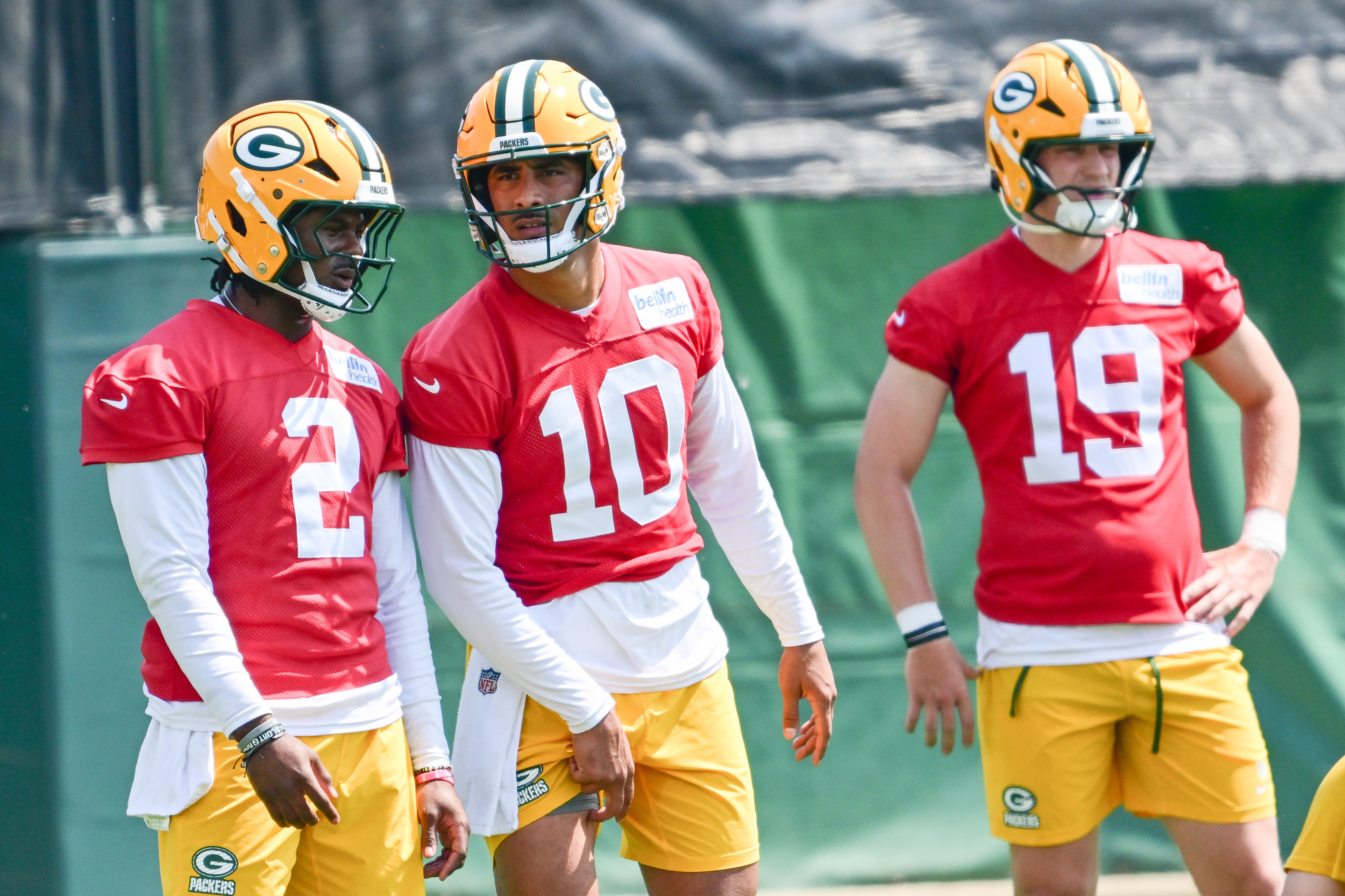 Green Bay Packers quarterback Malik Willis (2), quarterback Jordan Love (10) and quarterback Taylor Elgersma (19) participates in the team's minicamp at Ray Nitschke Field.