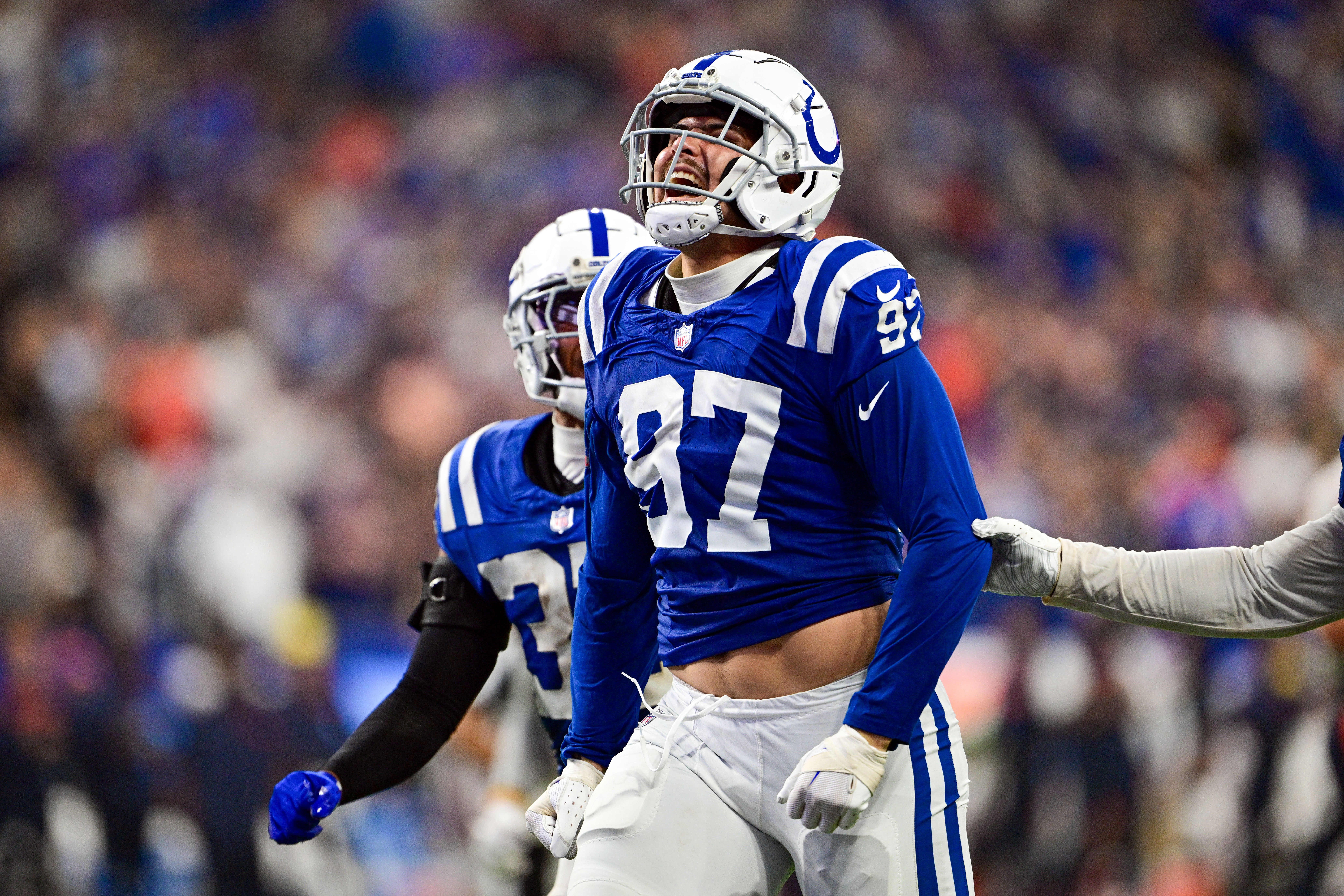 Sep 22, 2024; Indianapolis, Indiana, USA; Indianapolis Colts defensive end Laiatu Latu (97) celebrates a sack during the second half against the Chicago Bears at Lucas Oil Stadium.