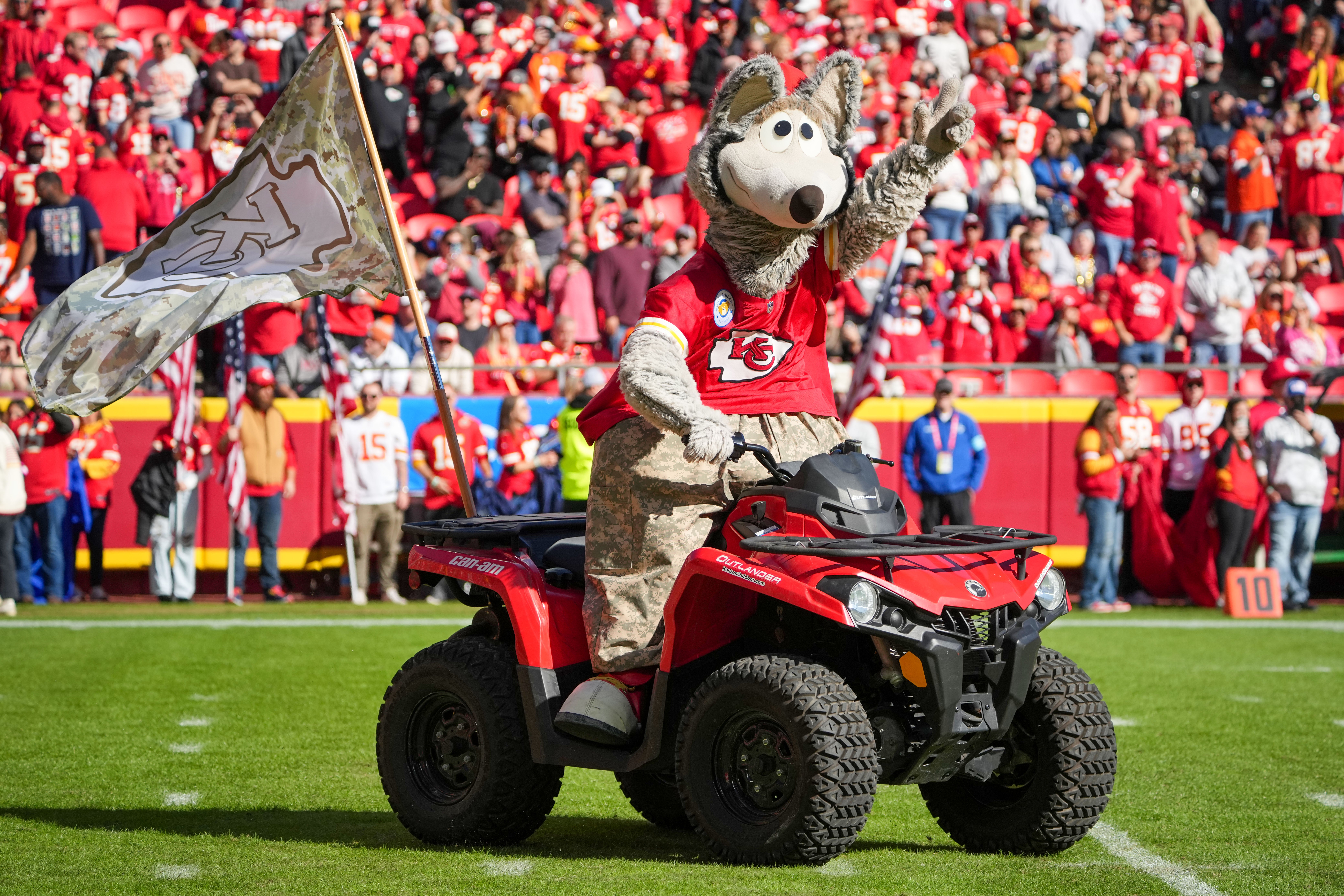 Nov 10, 2024; Kansas City, Missouri, USA; The Kansas City Chiefs mascot KC Wolf rides an atv on field against the Denver Broncos prior to a game at GEHA Field at Arrowhead Stadium.