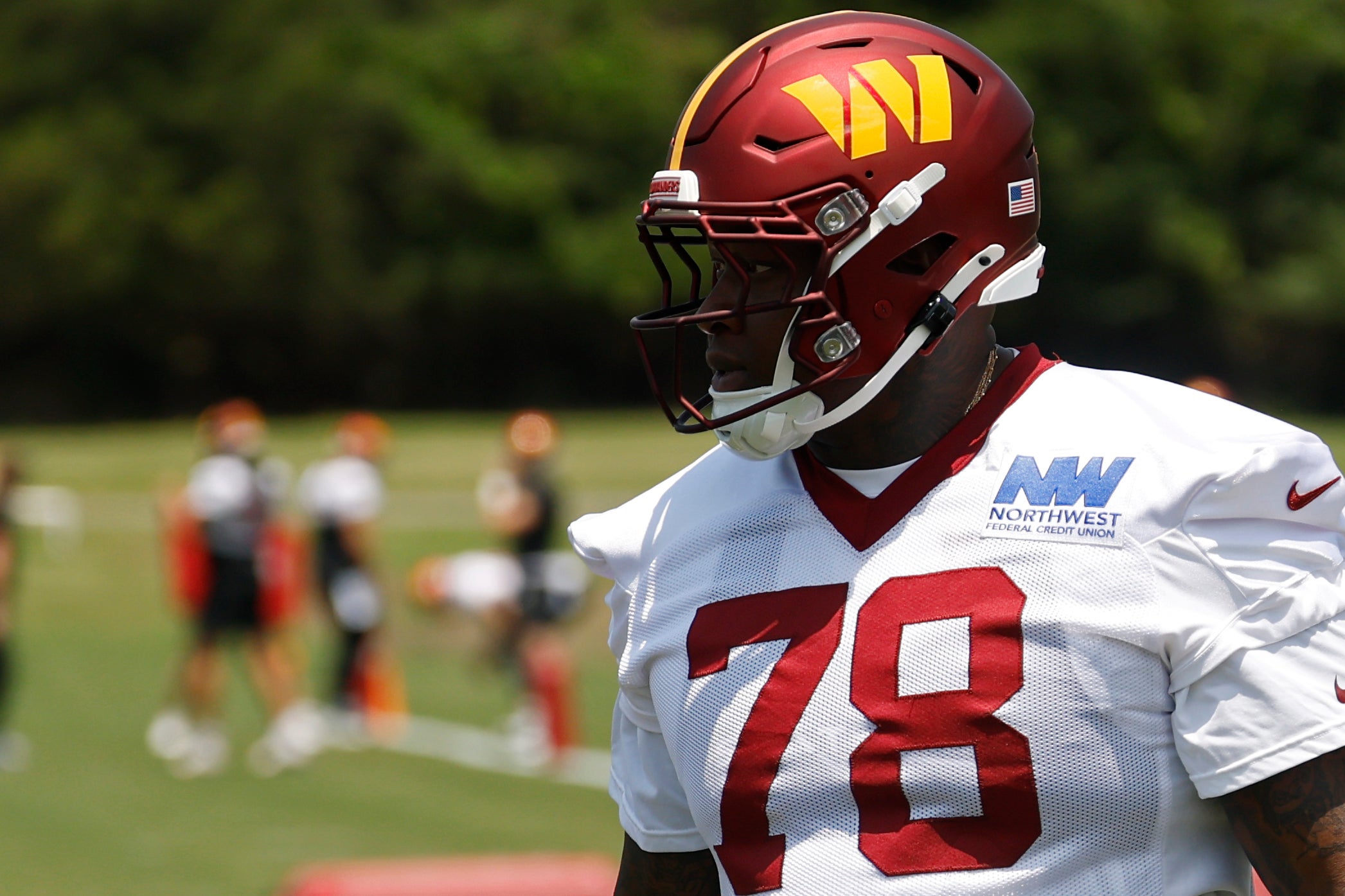 Jun 10, 2025; Ashburn, VA, USA; Washington Commanders offensive tackle Laremy Tunsil (78) stands on the field on day one of minicamp at Commanders Park.