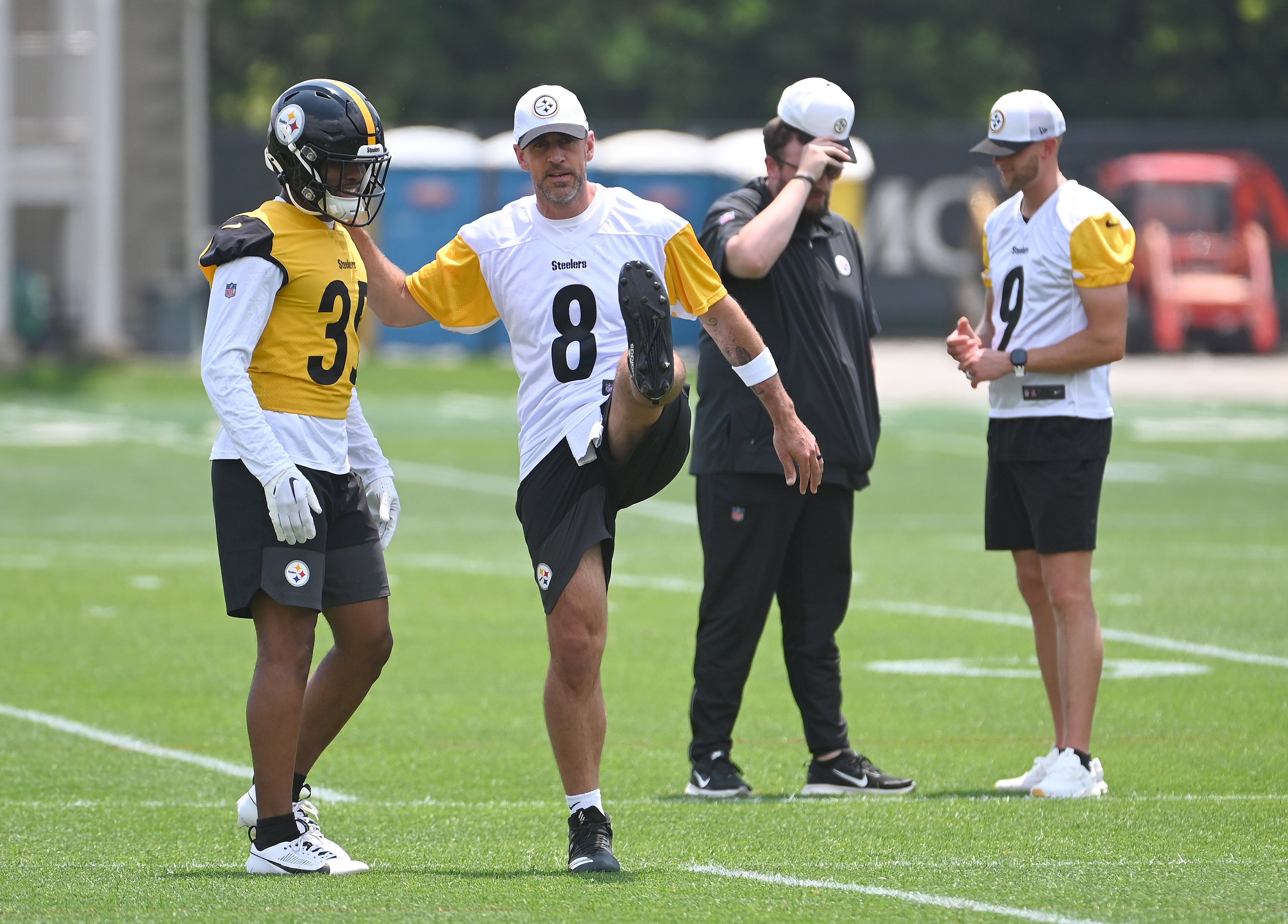 Jun 10, 2025; Pittsburgh, PA, USA; Pittsburgh Steelers quarterback Aaron Rodgers (8) stretches during minicamp at their South Side facility.