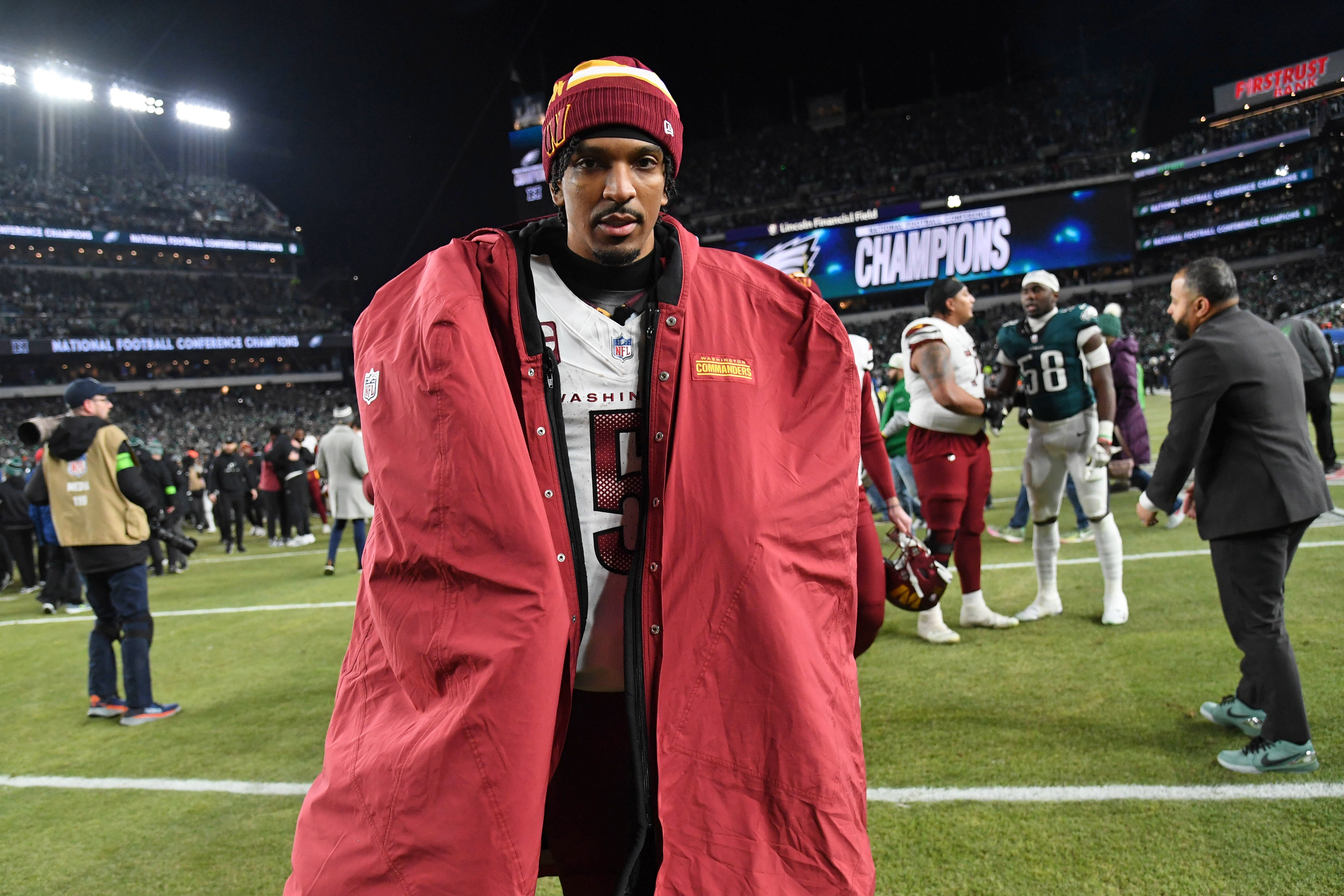 Jan 26, 2025; Philadelphia, PA, USA; Washington Commanders quarterback Jayden Daniels (5) walks off the field after losing the NFC Championship game against the Philadelphia Eagles at Lincoln Financial Field.