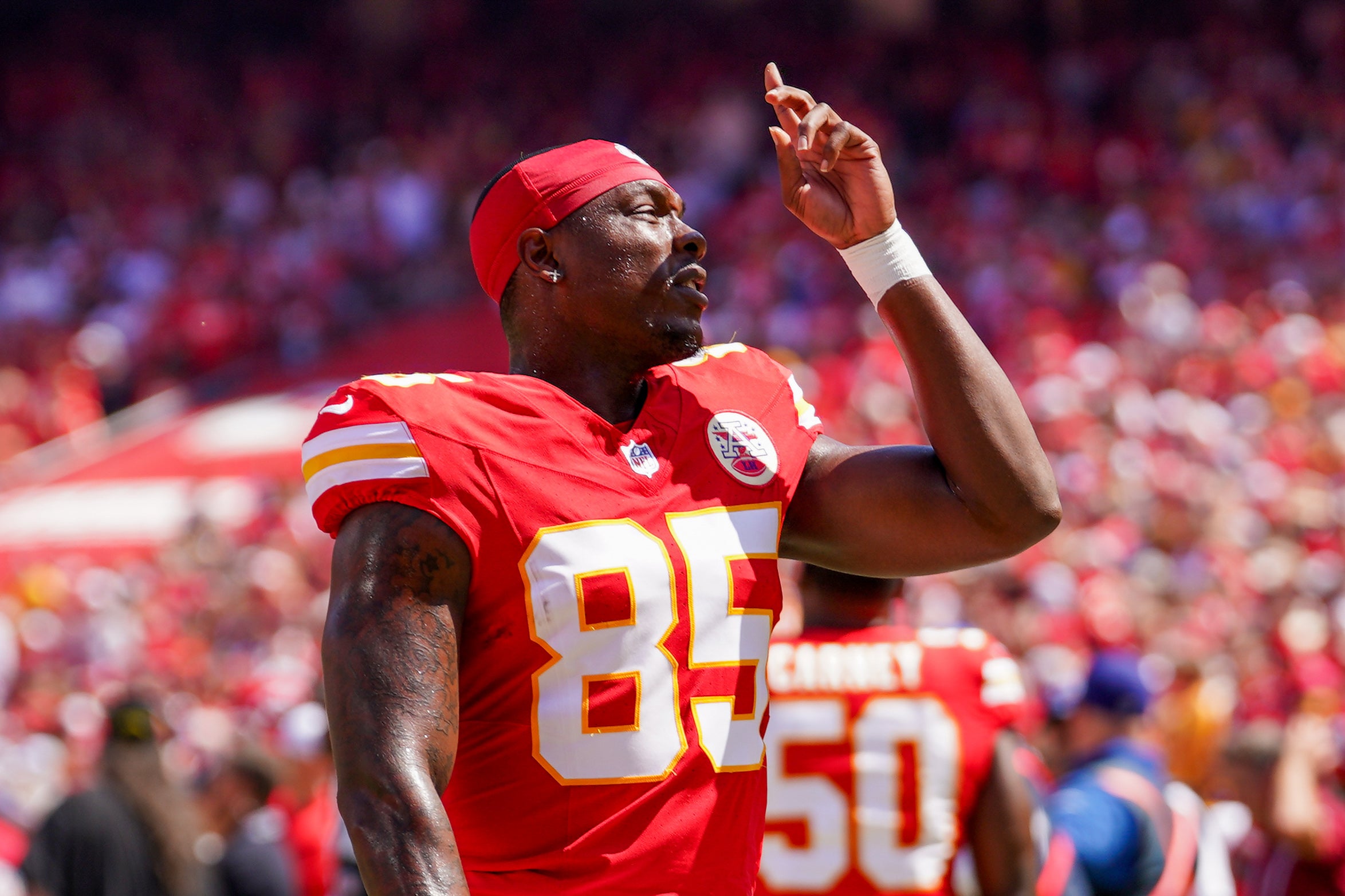 Aug 17, 2024; Kansas City, Missouri, USA; Kansas City Chiefs tight end Geor'Quarius Spivey (85) gestures on field against the Detroit Lions prior to the game at GEHA Field at Arrowhead Stadium.