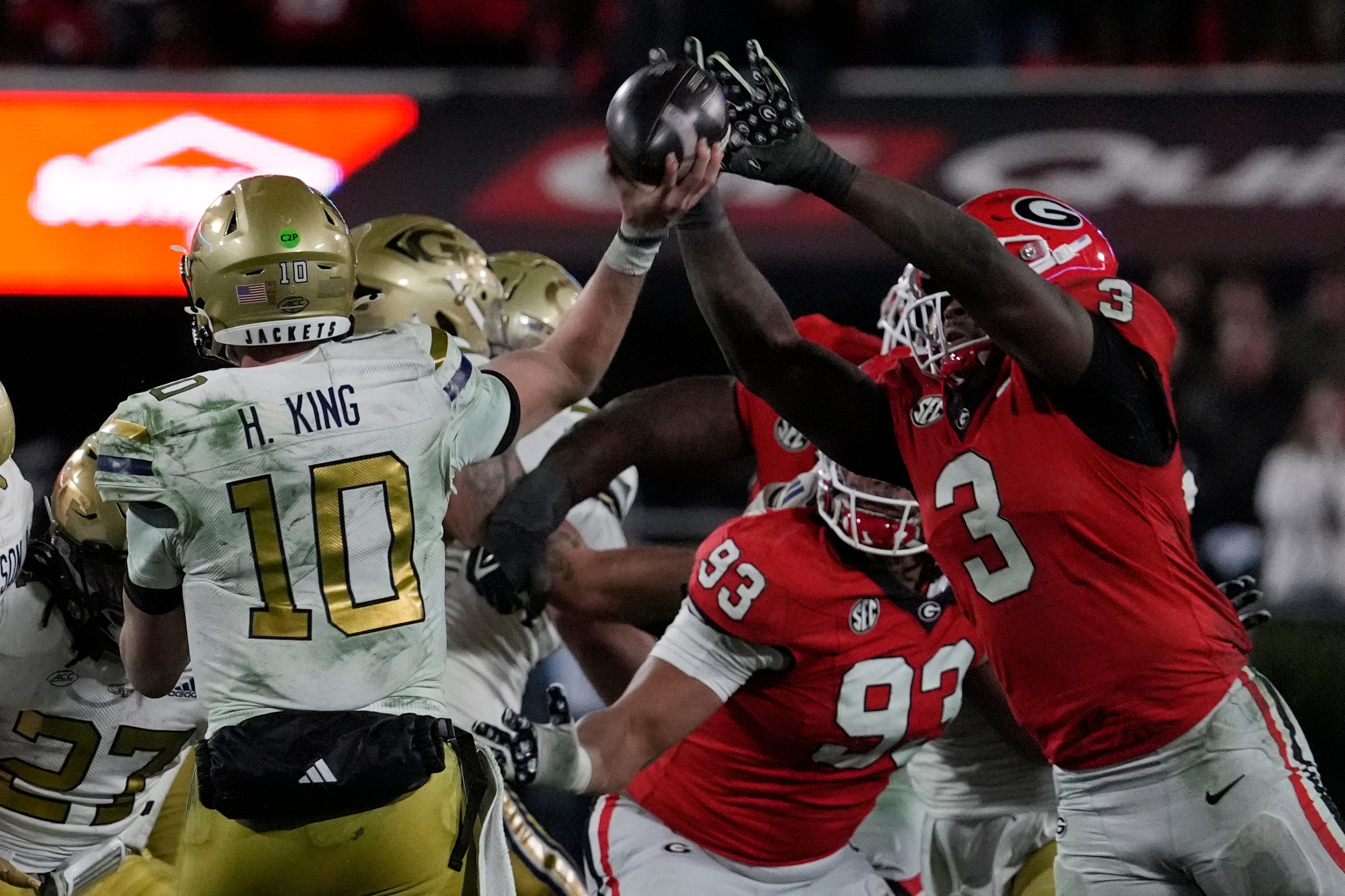 Georgia linebacker CJ Allen (3) blocks a pass from Georgia Tech quarterback Haynes King (10) during the second half of a NCAA college football game against Georgia Tech in Athens, Ga., on Friday.