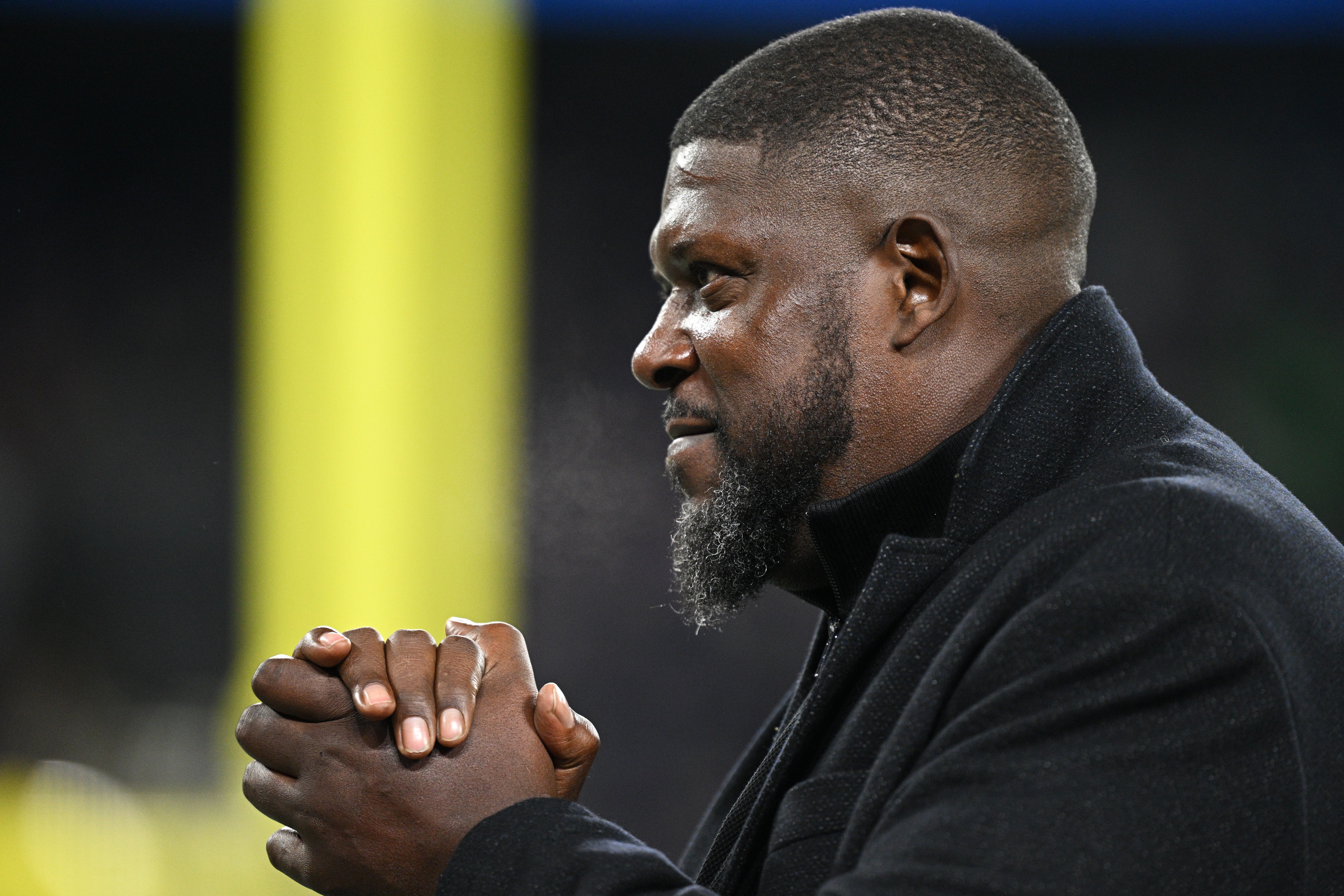 Jan 11, 2025; Baltimore, Maryland, USA; Former Baltimore Ravens player Willie Anderson looks on in the second quarter between the Baltimore Ravens and the Pittsburgh Steelers in an AFC wild card game at M&T Bank Stadium.