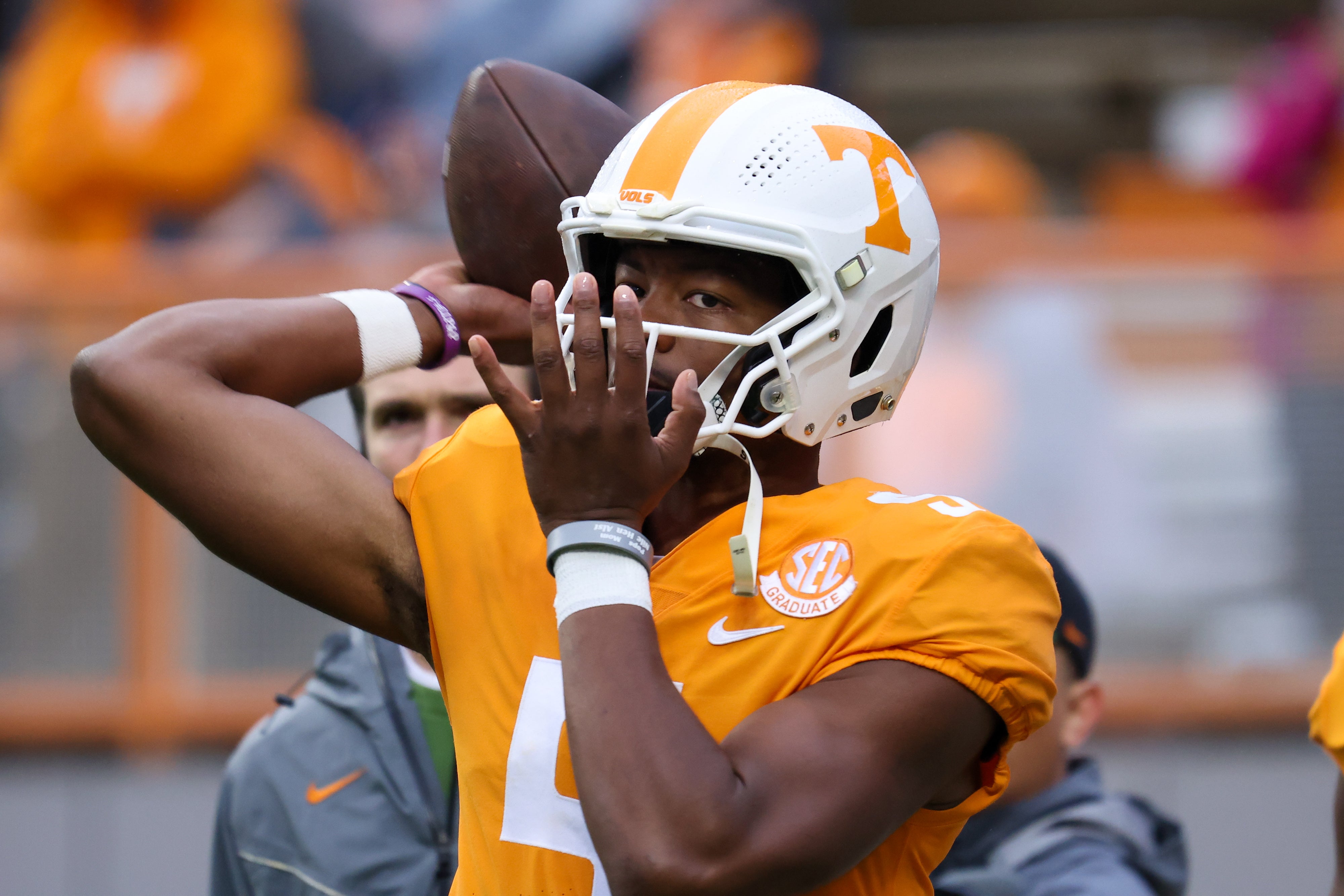 Former Tennessee Vols QB Hendon Hooker warming up before a game where he easily led Josh Heupel's team to victory.
