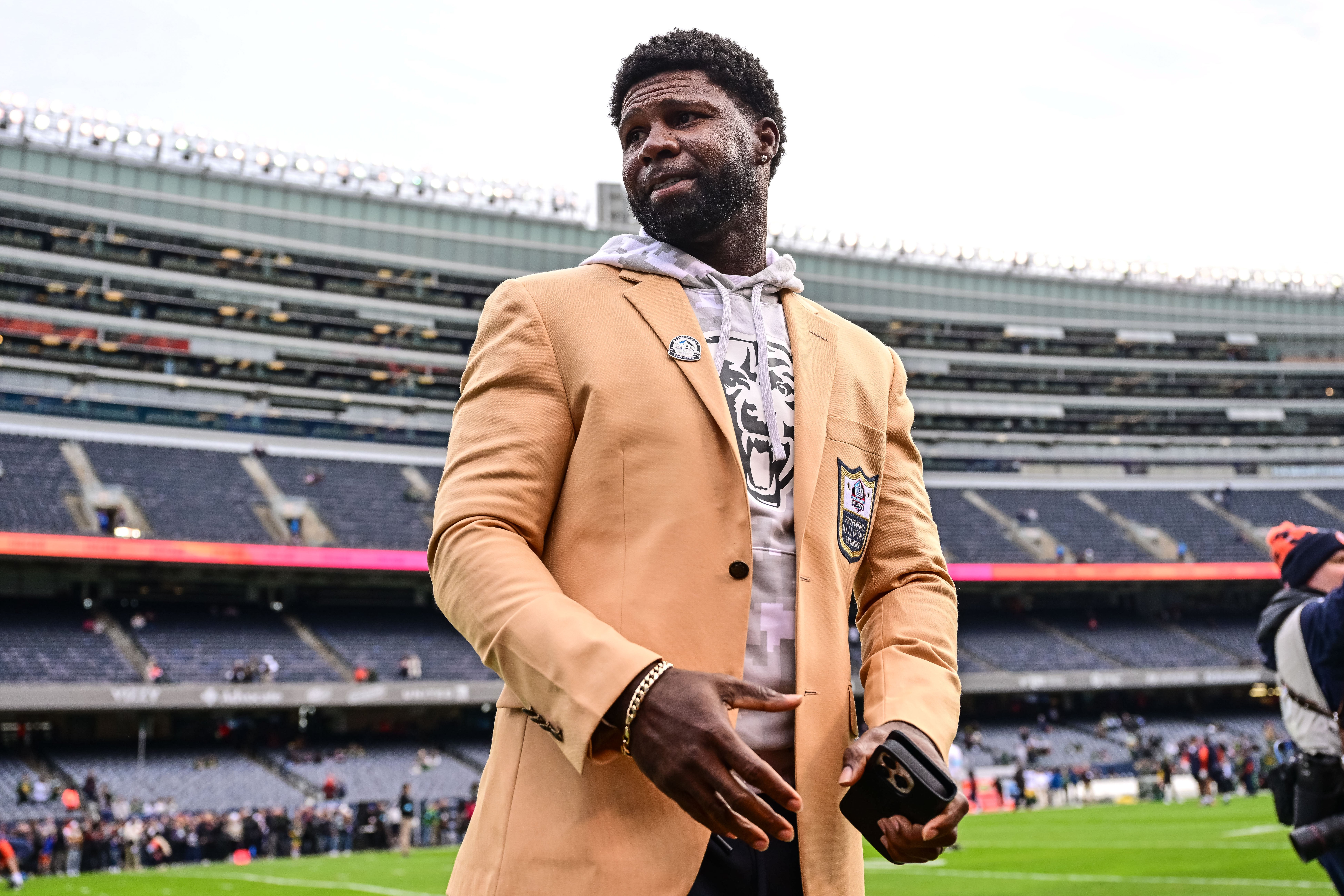 Nov 17, 2024; Chicago, Illinois, USA; Hall of Fame former player Devin Hester looks on before the game between the Chicago Bears and Green Bay Packers at Soldier Field.