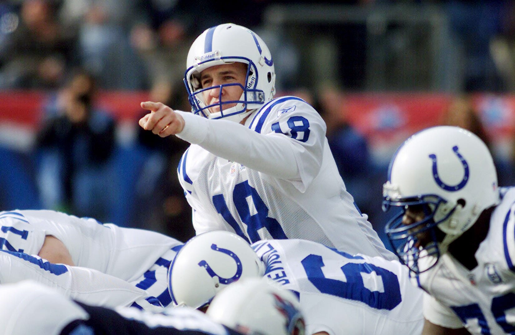 Indianapolis Colts quarterback Peyton Manning (18) looks over the defense of the Tennessee Titans during their game at The Coliseum in Nashville on Dec. 8, 2002.