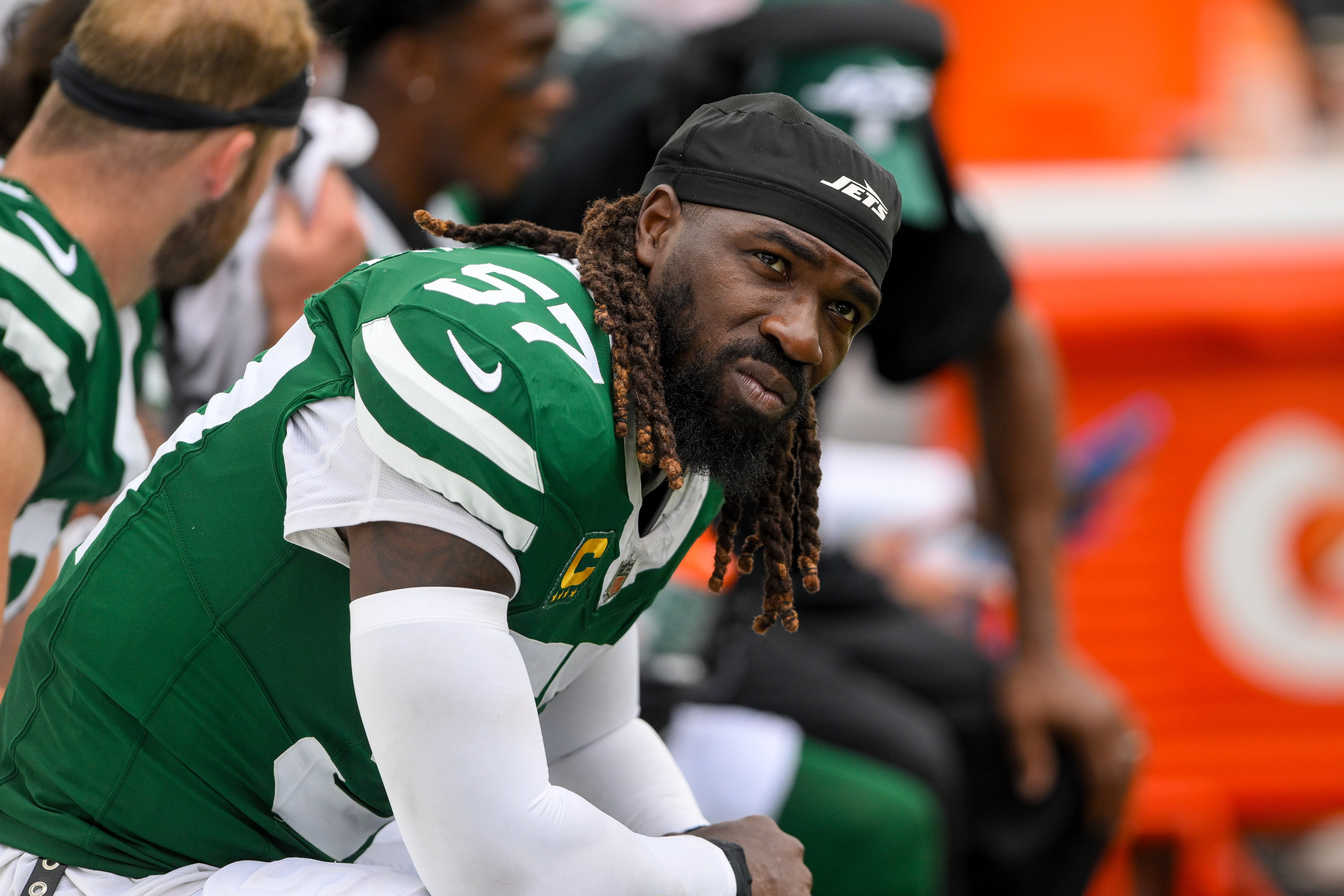 New York Jets linebacker C.J. Mosley (57) looks up at the scoreboard from the bench against the Tennessee Titans during the second half during the second half at Nissan Stadium.