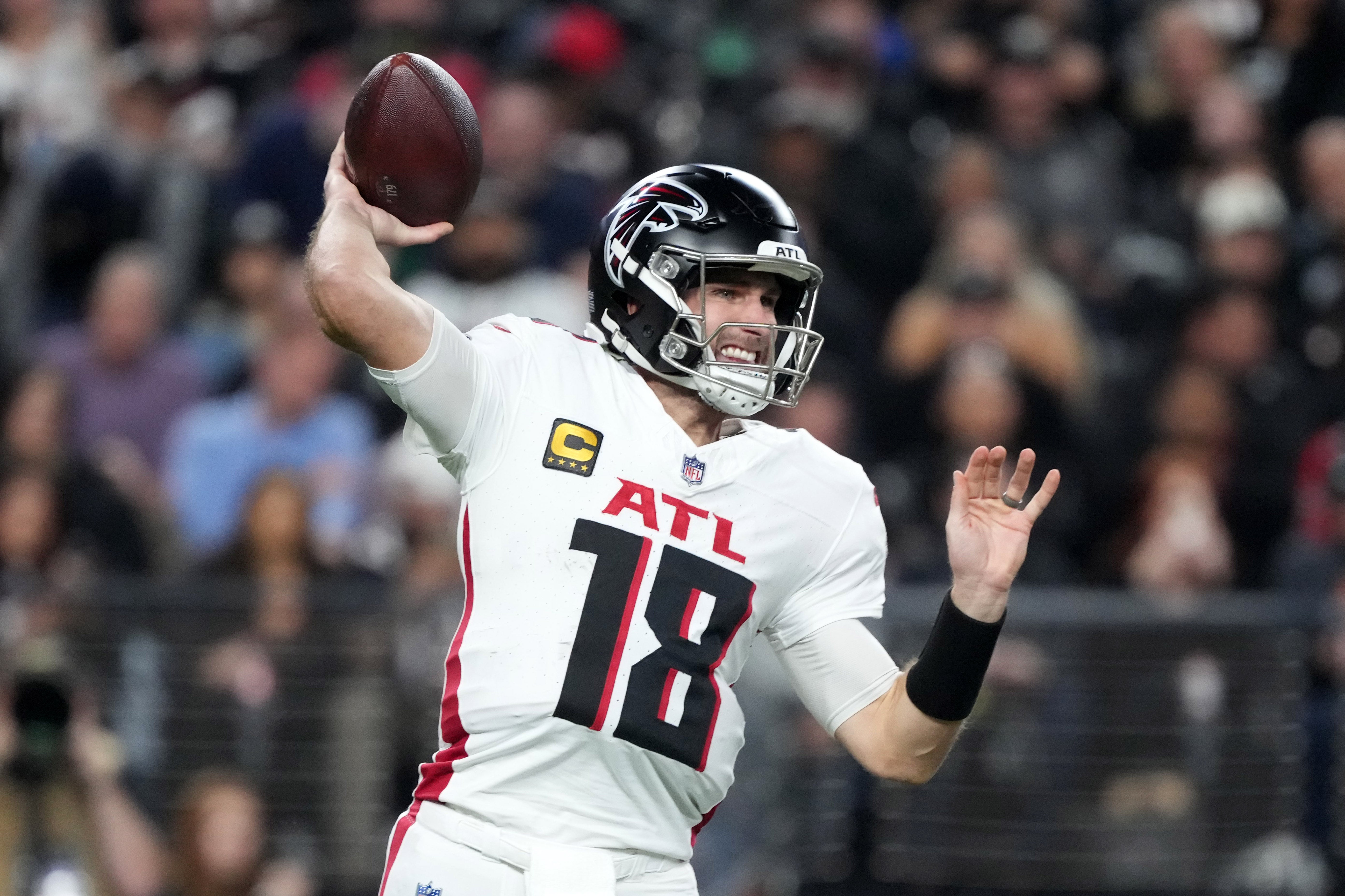 Dec 16, 2024; Paradise, Nevada, USA; Atlanta Falcons quarterback Kirk Cousins (18) throws the ball against the Las Vegas Raiders in the first half at Allegiant Stadium.