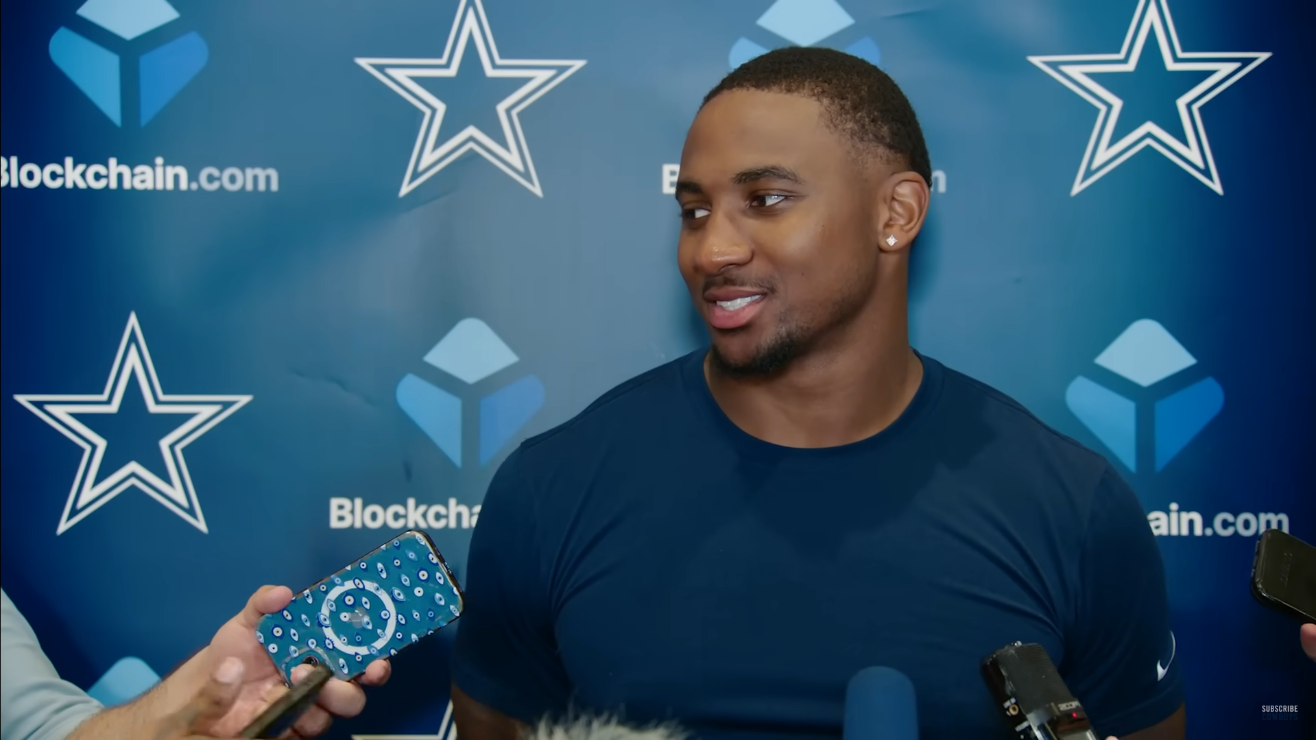 Dallas Cowboys edge rusher Donovan Ezeiruaku talks to the media during mandatory minicamp.