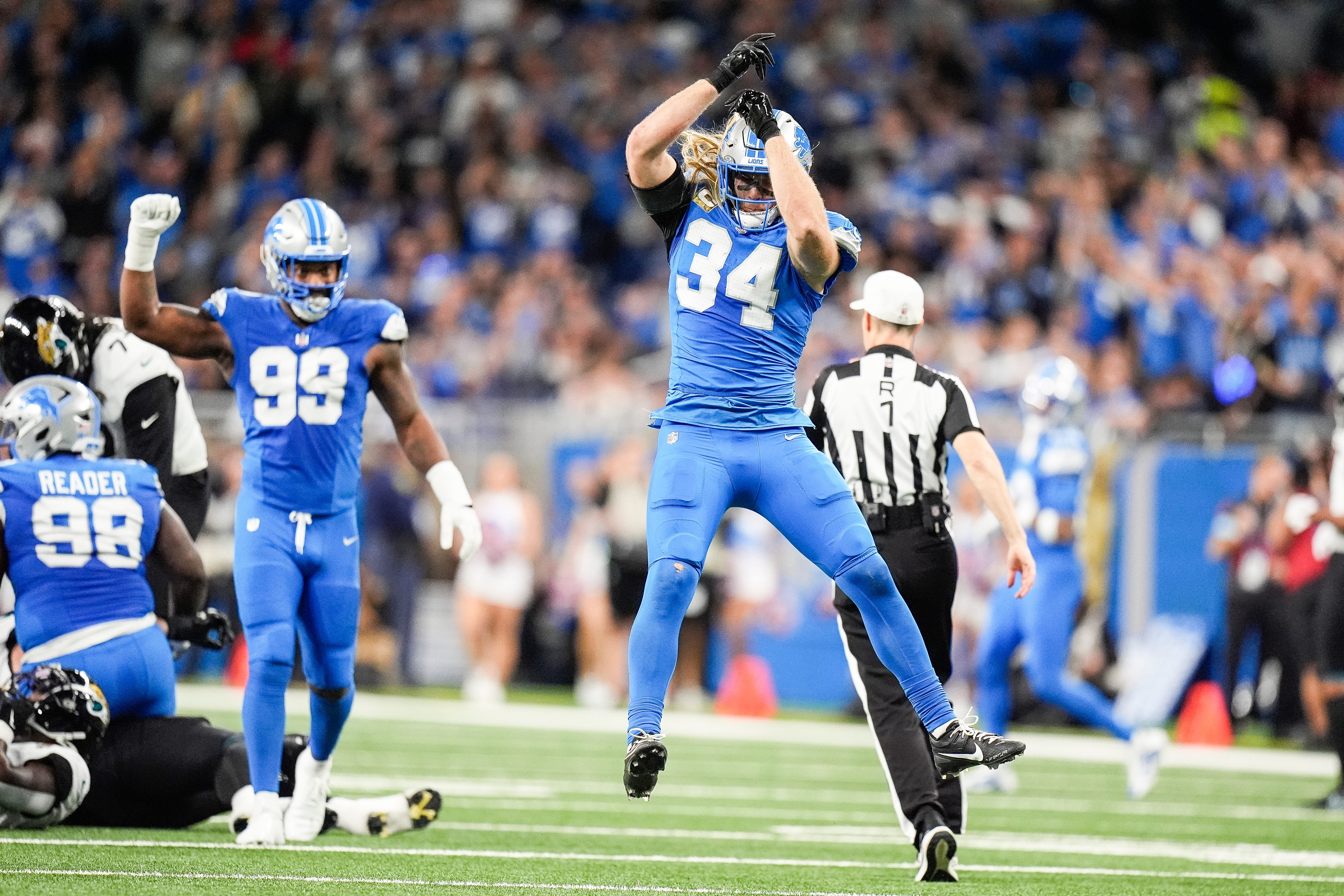 Detroit Lions linebacker Alex Anzalone (34) celebrates a play against Jacksonville Jaguars during the first half at Ford Field in Detroit on Sunday, Nov. 17, 2024.
