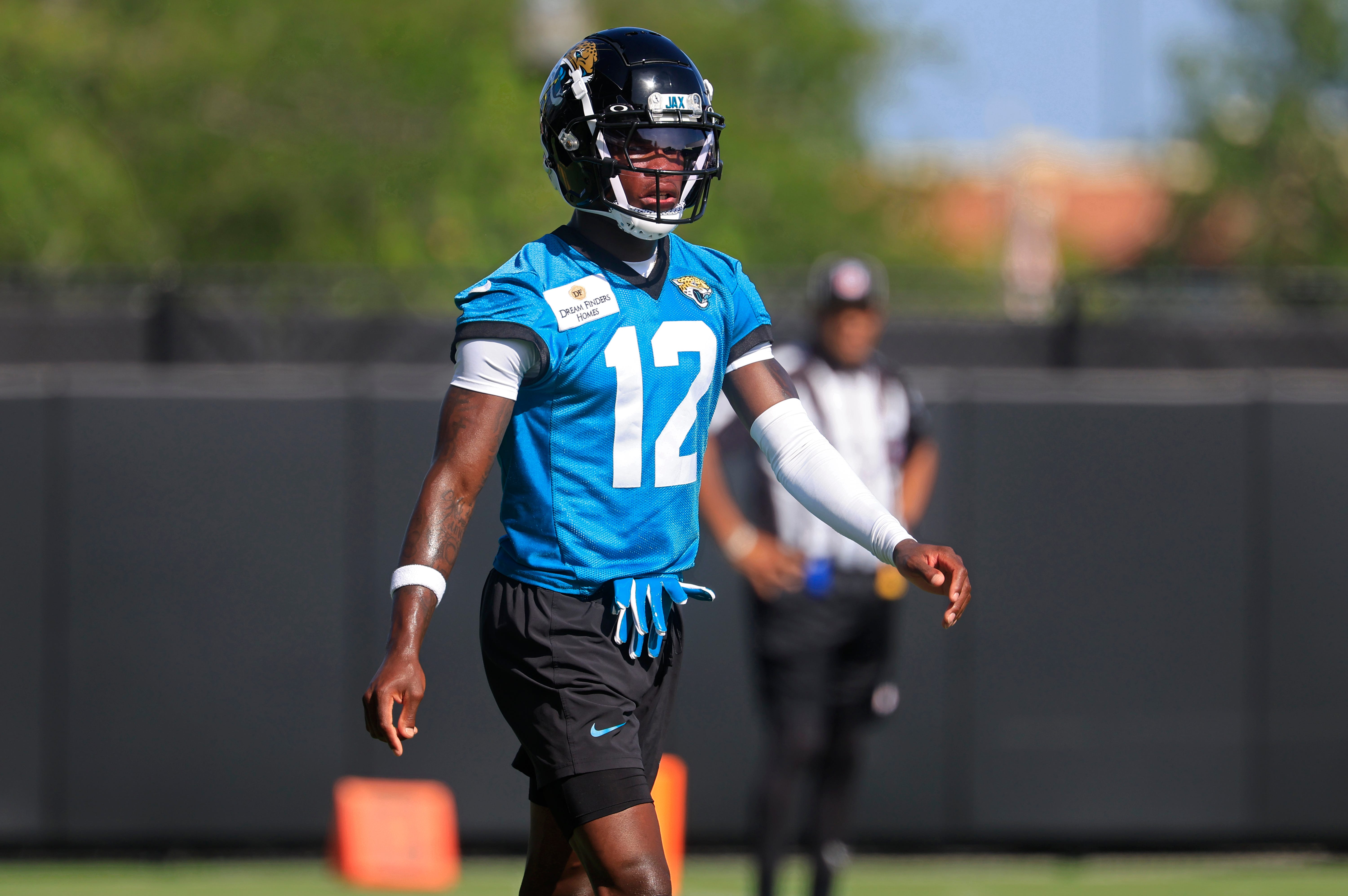 Jacksonville Jaguars wide receiver Travis Hunter (12) walks on the field during the second mandatory minicamp at Miller Electric Center Wednesday, June 11, 2025 in Jacksonville, Fla.