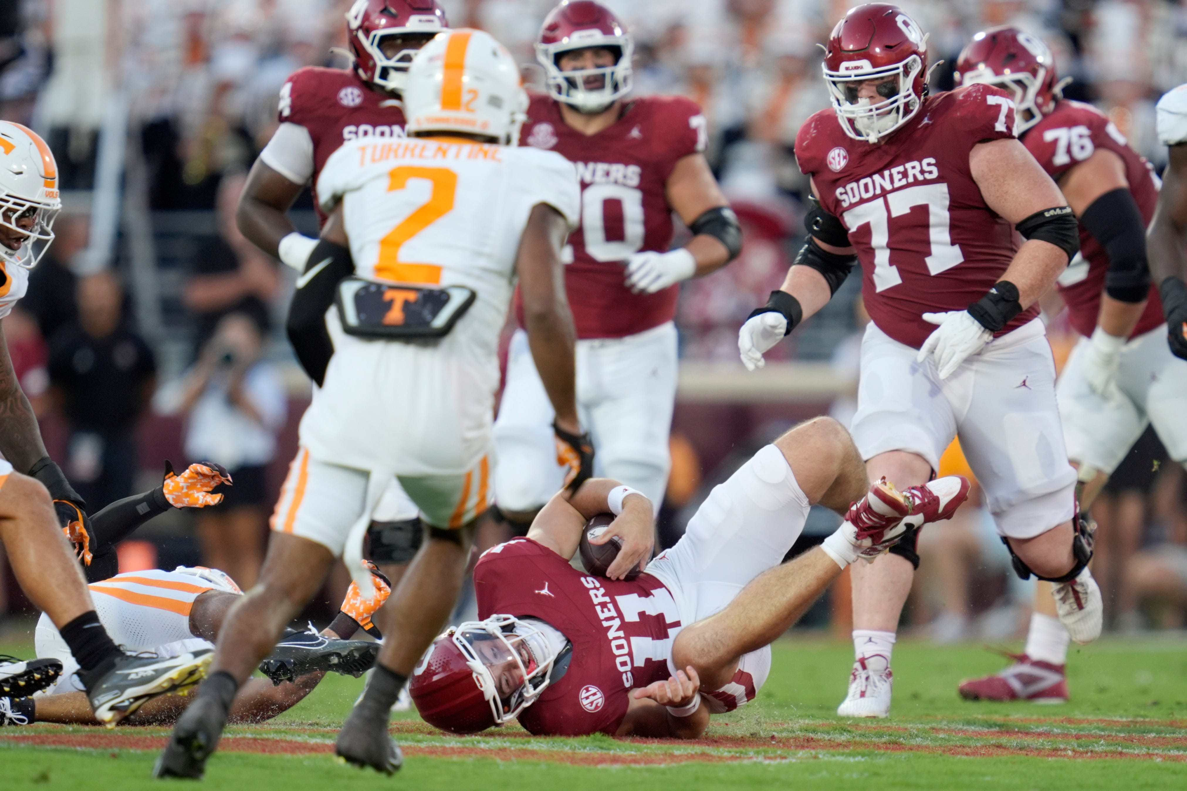 Oklahoma Sooners quarterback Jackson Arnold (11) is brought down during a college football game between the University of Oklahoma Sooners (OU) and the Tennessee Volunteers at Gaylord Family - Oklahoma Memorial Stadium in Norman, Okla., Saturday, Sept. 21, 2024.