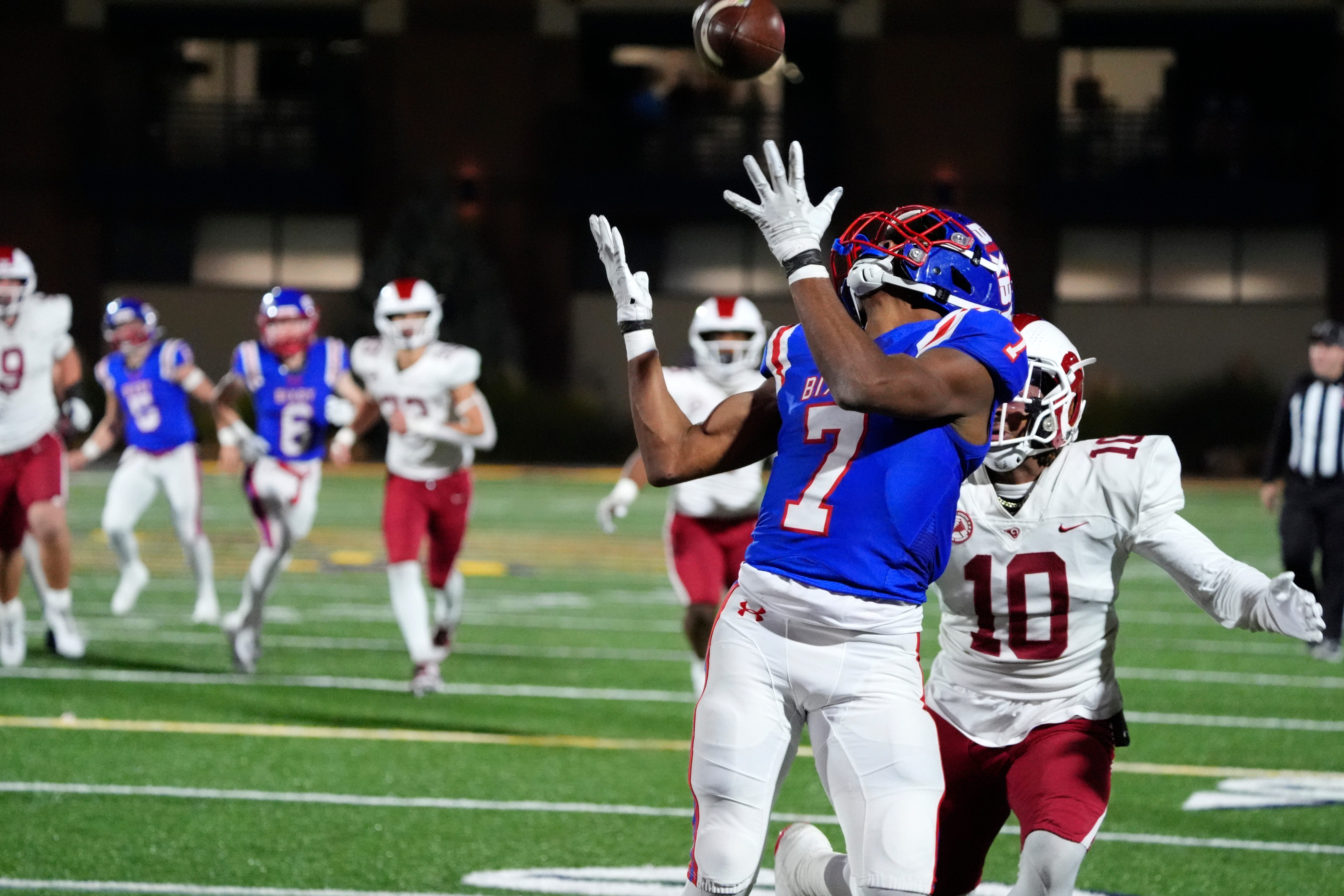 Bixby's Braeden Presley catches a touchdown pass in front of Owasso's Jaylon Moll during the Class 6A-I state football championship game between Owasso and Bixby at Chad Richison Stadium in Edmond, Okla., Friday, Dec. 6, 2024.