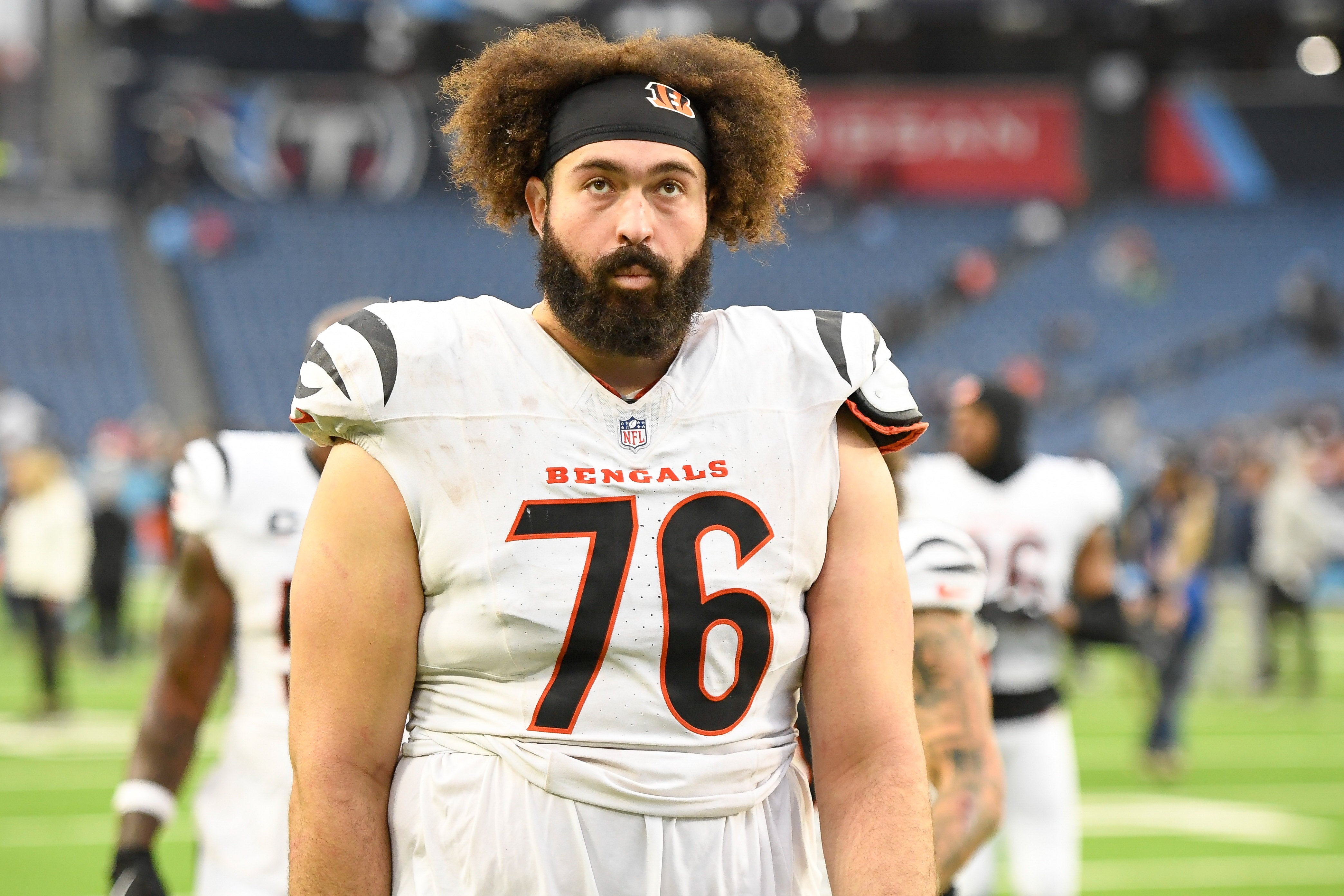 Dec 15, 2024; Nashville, Tennessee, USA; Cincinnati Bengals offensive tackle Devin Cochran (76) walks off the field after the game against the Tennessee Titans at Nissan Stadium.
