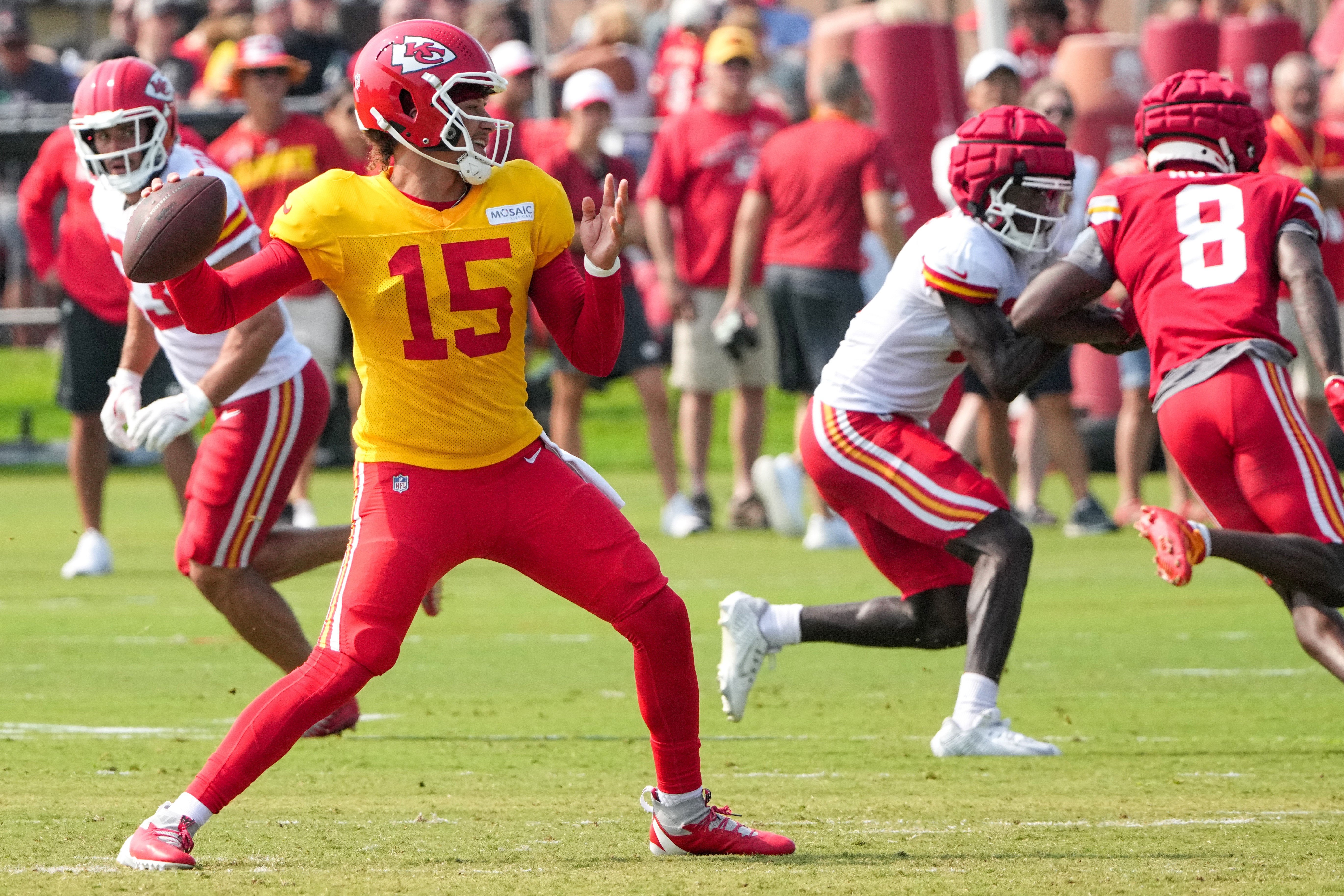 Jul 26, 2024; Kansas City, MO, USA; Kansas City Chiefs quarterback Patrick Mahomes (15) throws a pass during training camp at Missouri Western State University.
