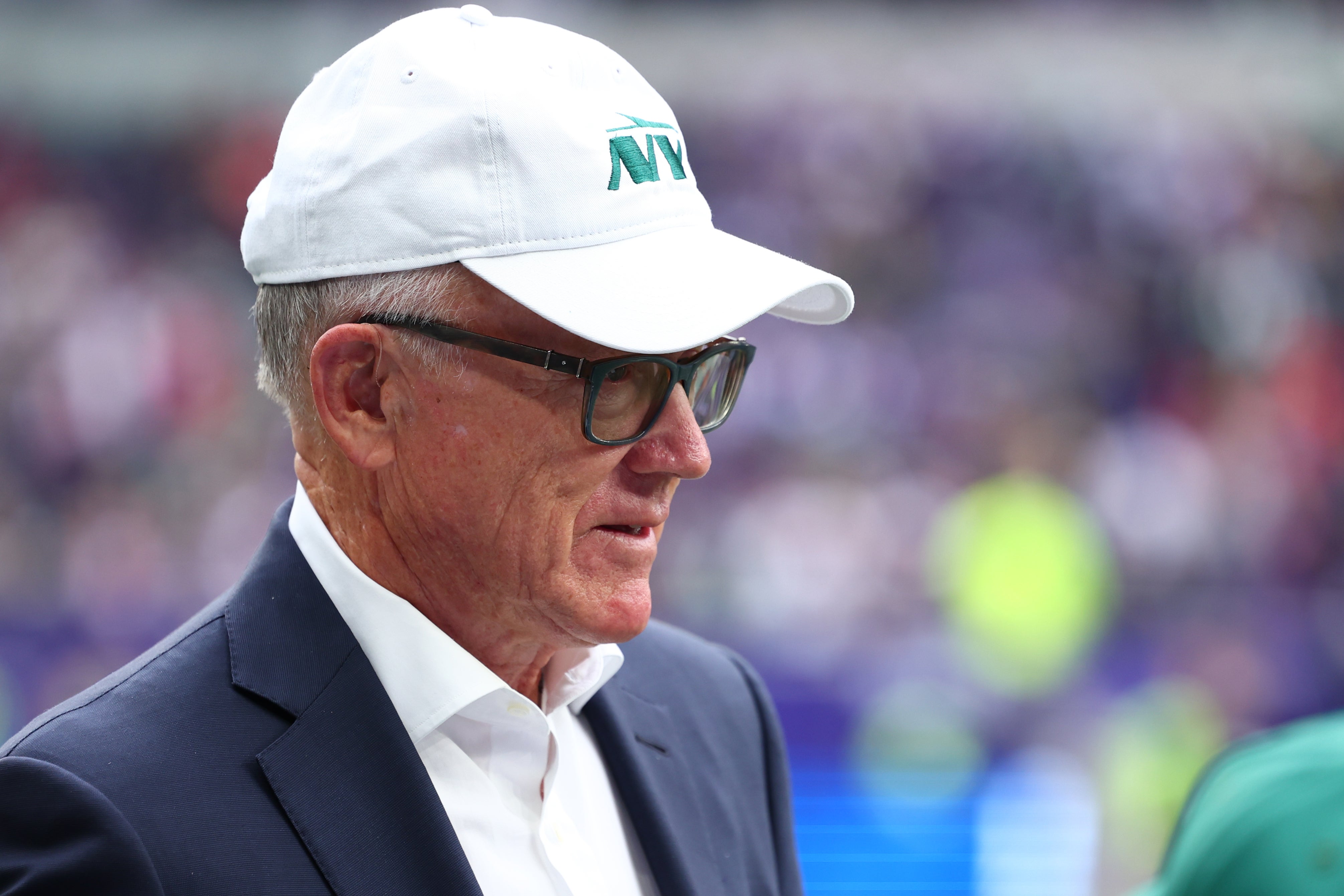 New York Jets owner Woody Johnson is pitch side before kick off against the Minnesota Vikings at Tottenham Hotspur Stadium.