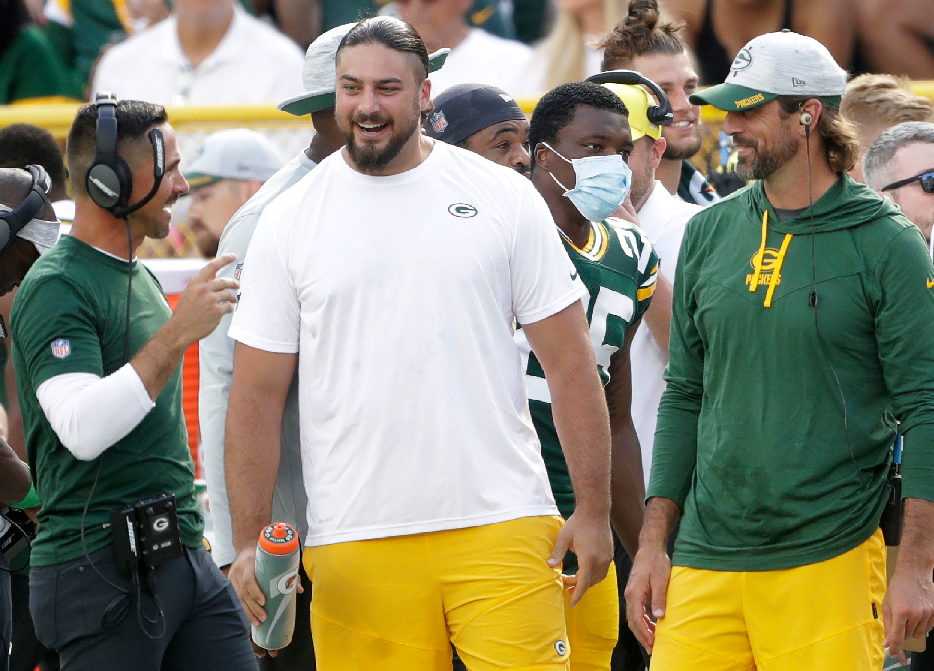 Green Bay Packers quarterback Aaron Rodgers (12), offensive tackle David Bakhtiari (69) and head coach Matt LeFleur against the New York Jets during their preseason football game on Saturday, August 21, 2021, at Lambeau Field in Green Bay