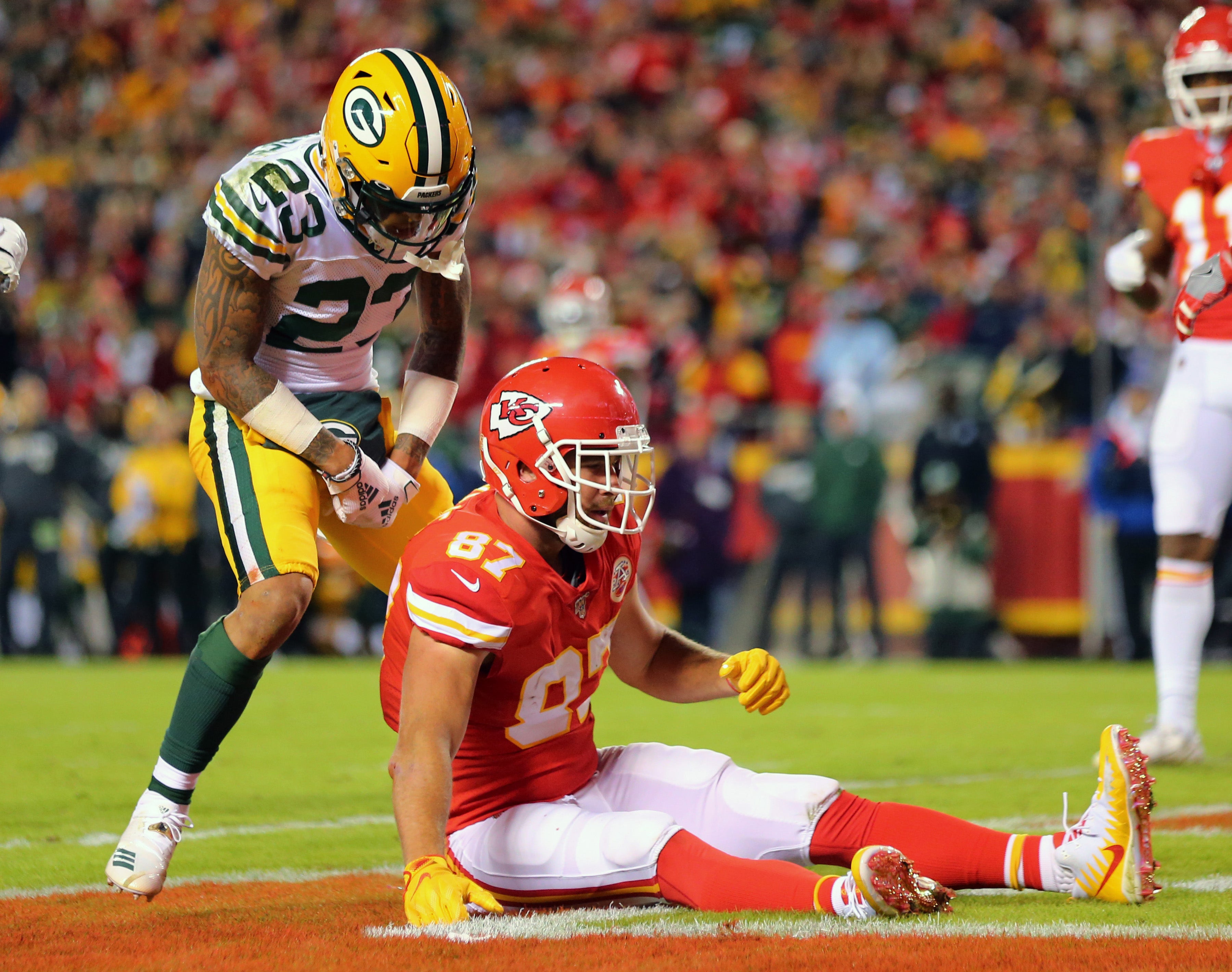 Oct 27, 2019; Kansas City, MO, USA; Green Bay Packers cornerback Jaire Alexander (23) reacts after breaking up a pass intended for Kansas City Chiefs tight end Travis Kelce (87) at Arrowhead Stadium.