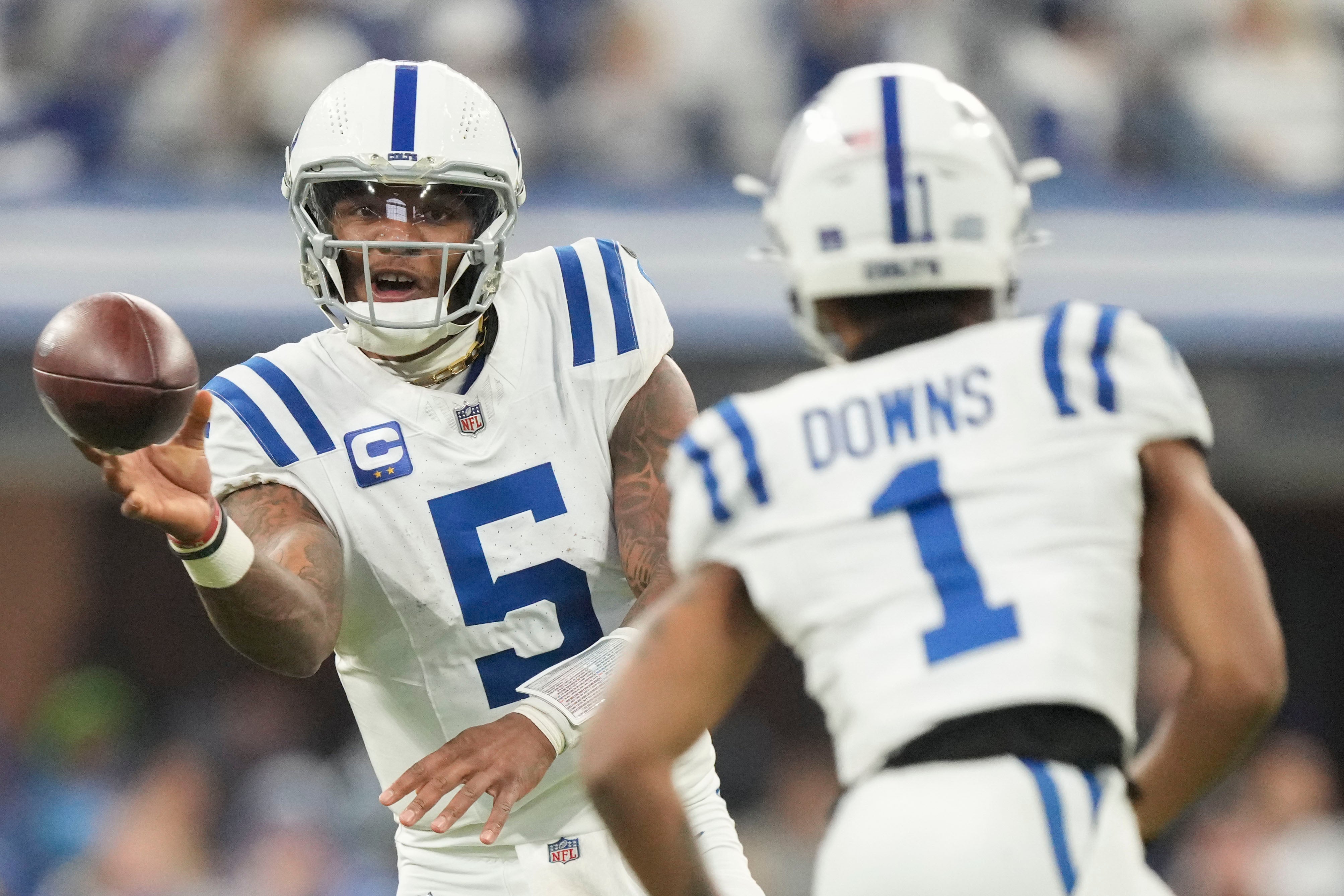 Dec 22, 2024; Indianapolis, Indiana, USA; Indianapolis Colts quarterback Anthony Richardson (5) passes to Indianapolis Colts wide receiver Josh Downs (1) during a game against the Tennessee Titans at Lucas Oil Stadium at Lucas Oil Stadium.
