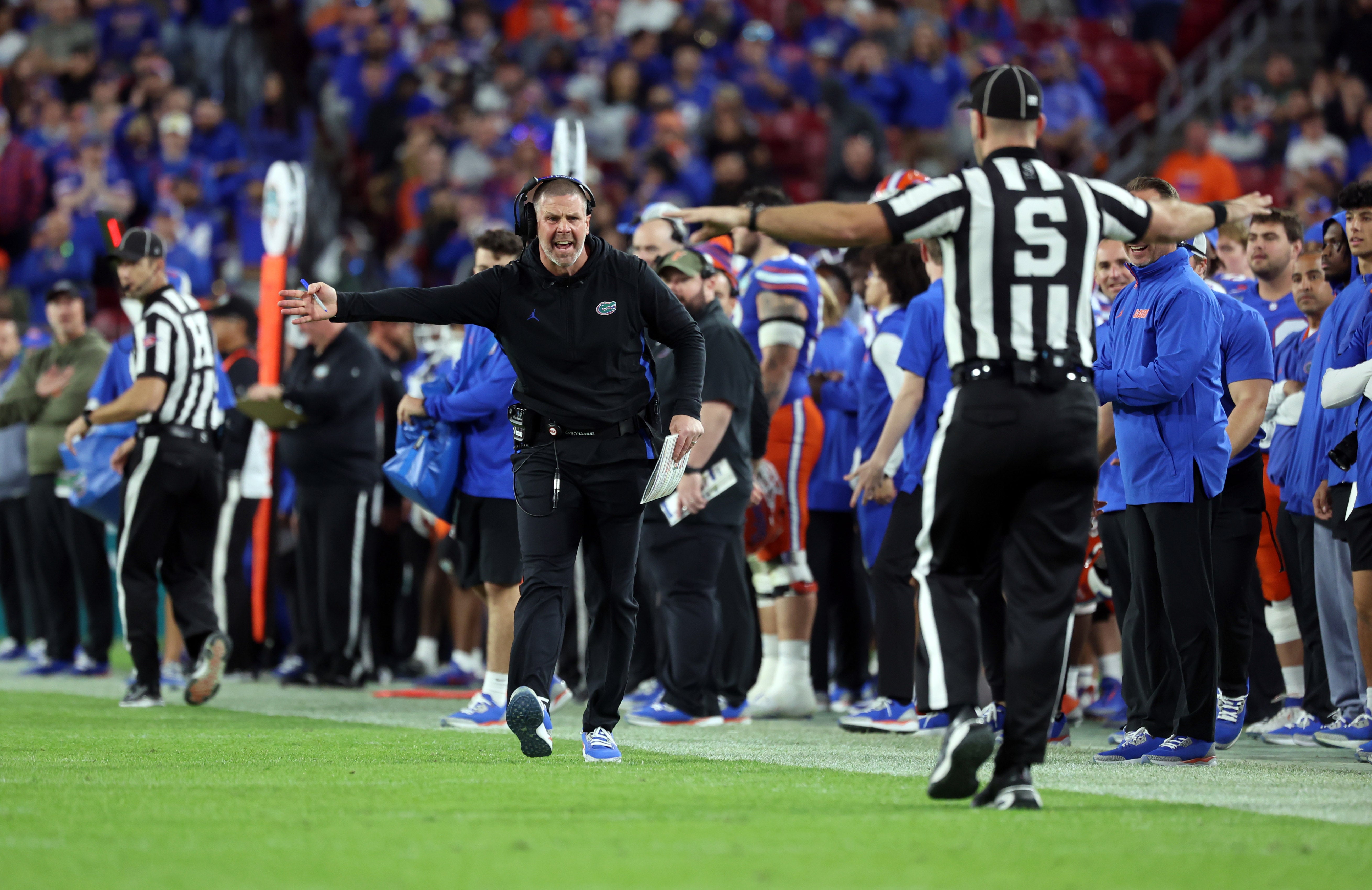 Dec 20, 2024; Tampa, FL, USA; Florida Gators head coach Billy Napier reacts against the Tulane Green Wave during the second half at Raymond James Stadium.