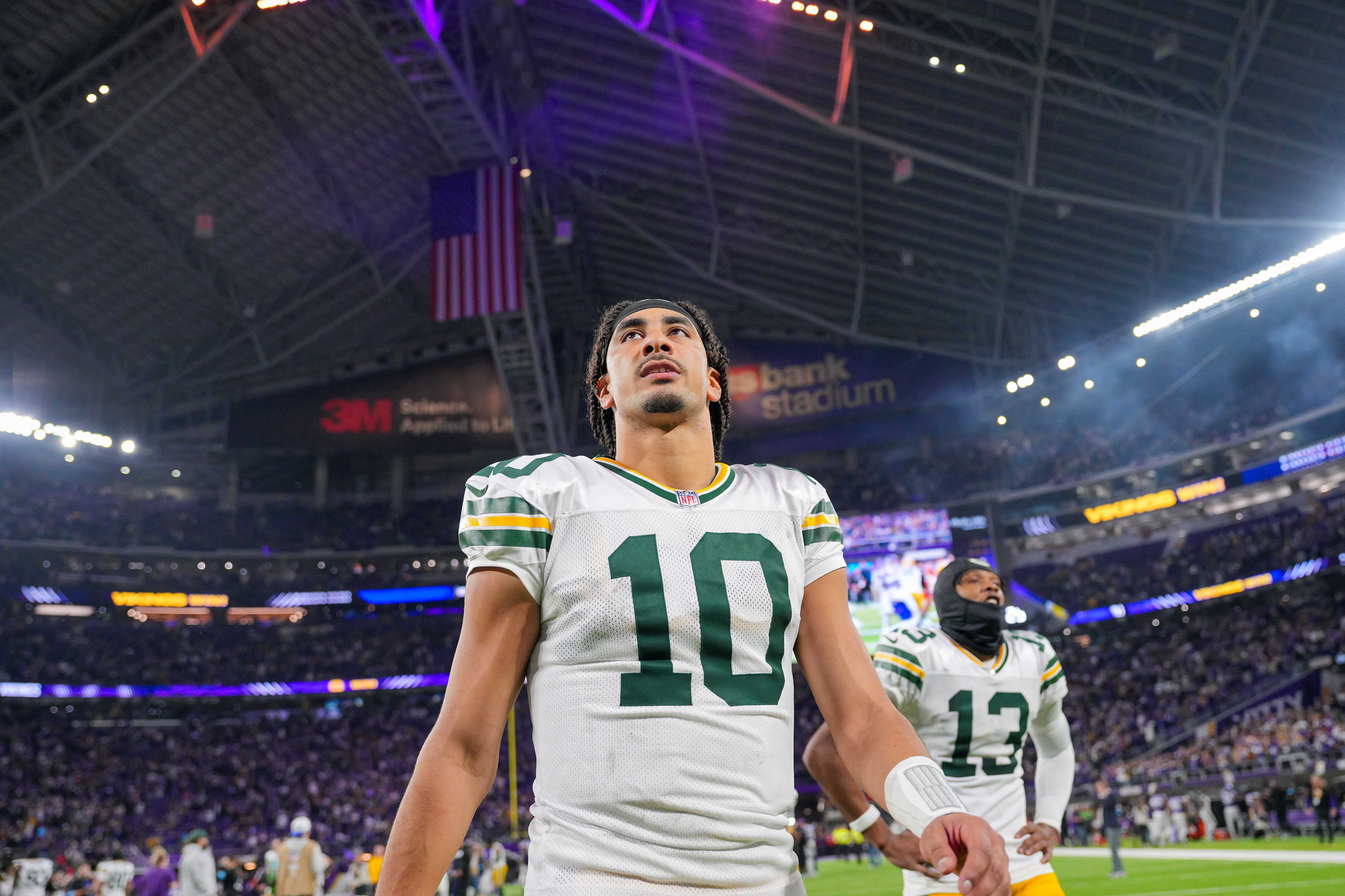 Green Bay Packers quarterback Jordan Love (10) leaves the field after the game against Minnesota Vikings at U.S. Bank Stadium.