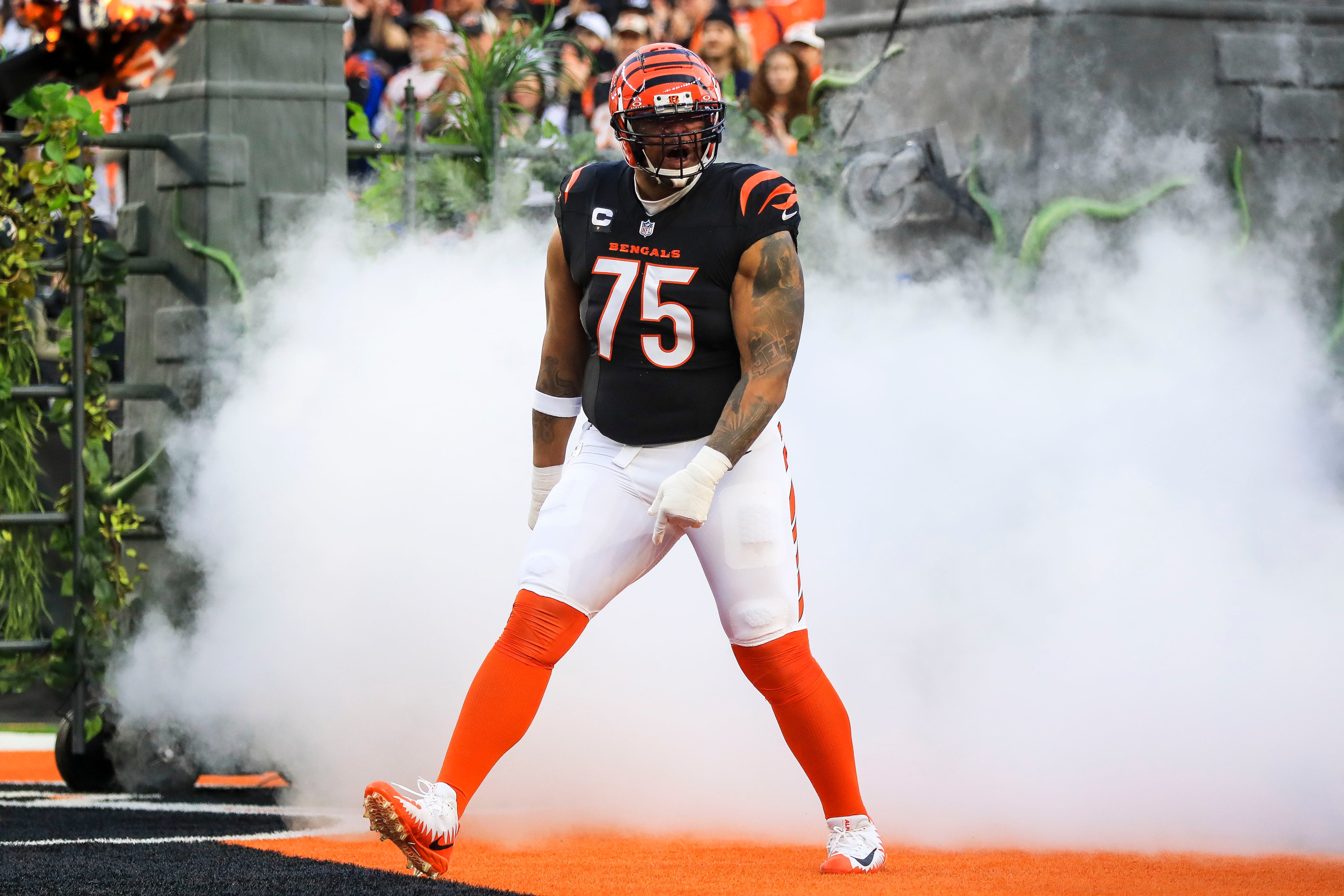 Dec 28, 2024; Cincinnati, Ohio, USA; Cincinnati Bengals offensive tackle Orlando Brown Jr. (75) runs onto the field before the game against the Denver Broncos at Paycor Stadium.