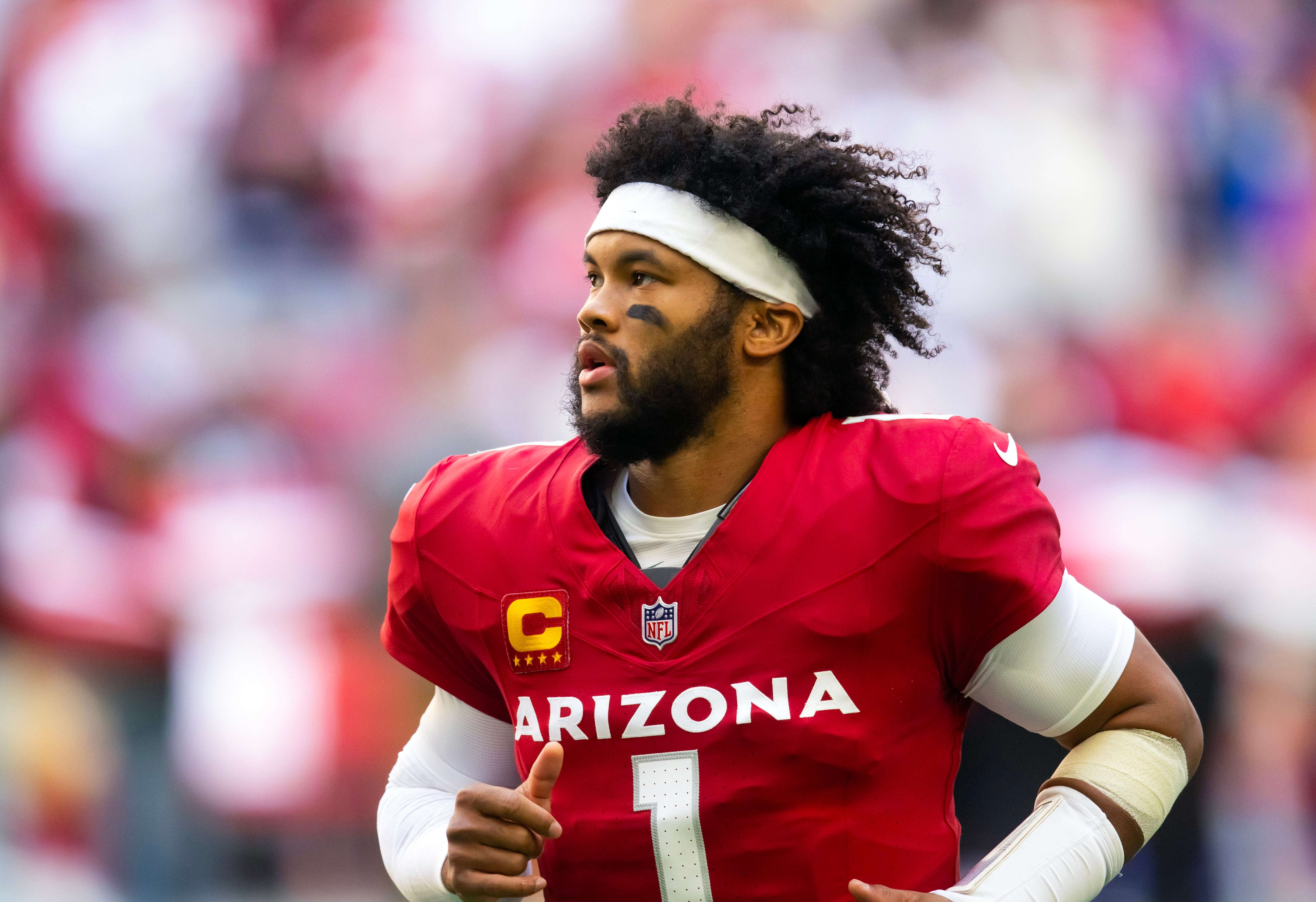 Jan 5, 2025; Glendale, Arizona, USA; Arizona Cardinals quarterback Kyler Murray (1) against the San Francisco 49ers at State Farm Stadium.