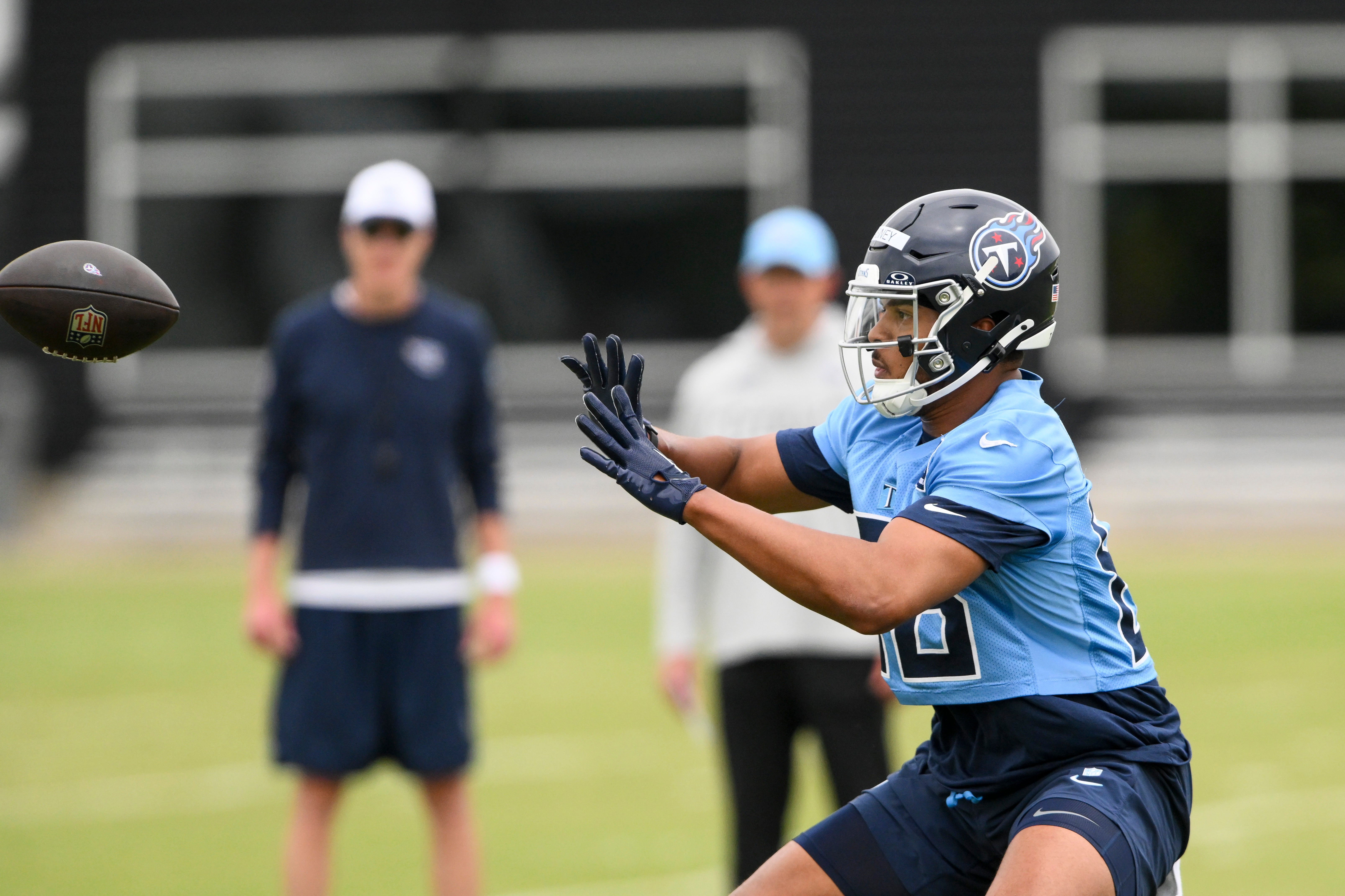 May 10, 2025; Nashville, TN, USA; Tennessee Titans running back Kalel Mullings (28) makes a catch as he goes through drills during Rookie Mini Camp at Saint Thomas Sports Park. Mandatory Credit: Steve Roberts-Imagn Images