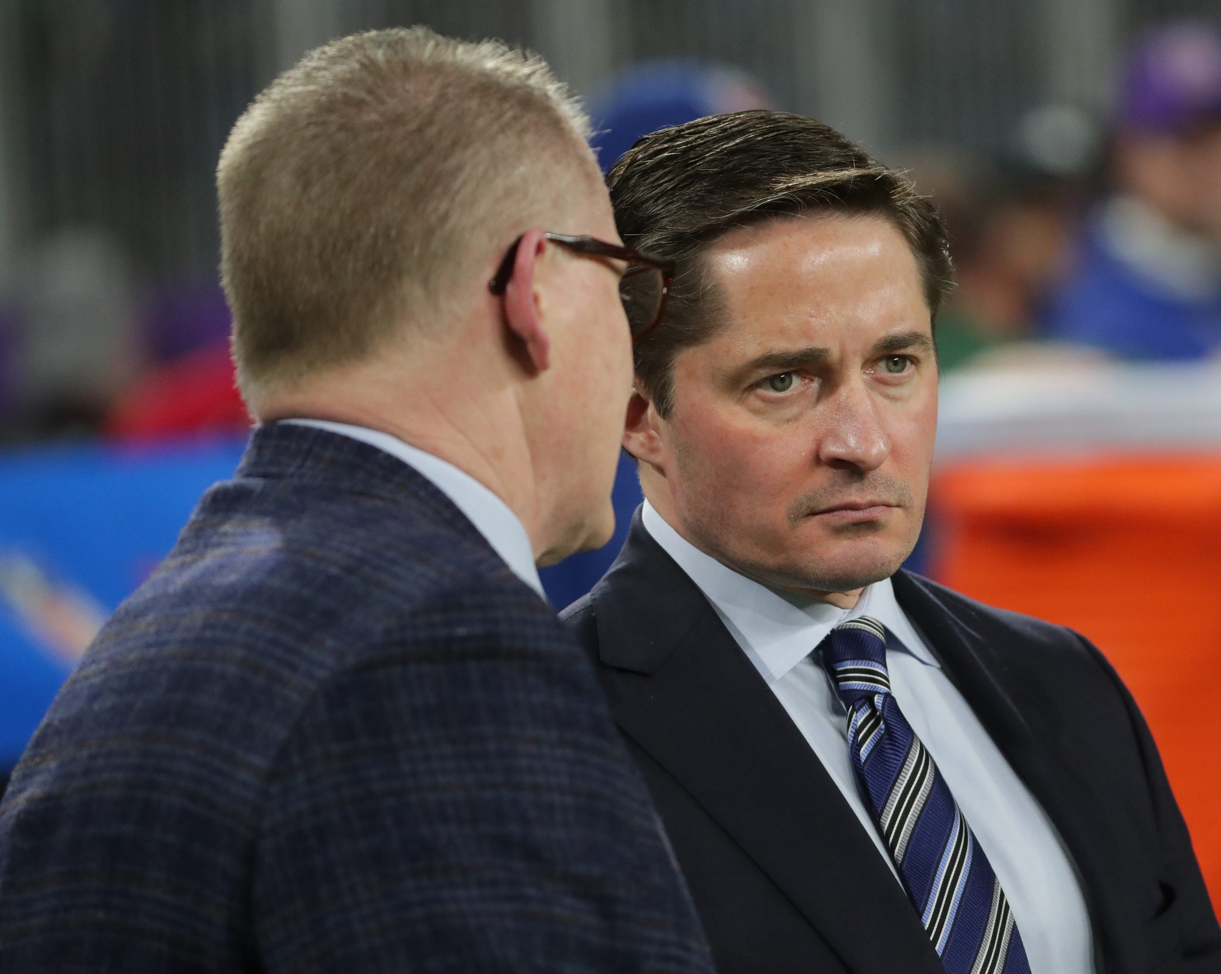 Green Bay Bay Packers chief operating officer and general counsel Ed Policy, right, listens to executive vice president/ director of football operations Russ Ball before their game against the Minnesota Vikings Monday, December 23, 2019 at US Bank Stadium in Minneapolis, Minn.