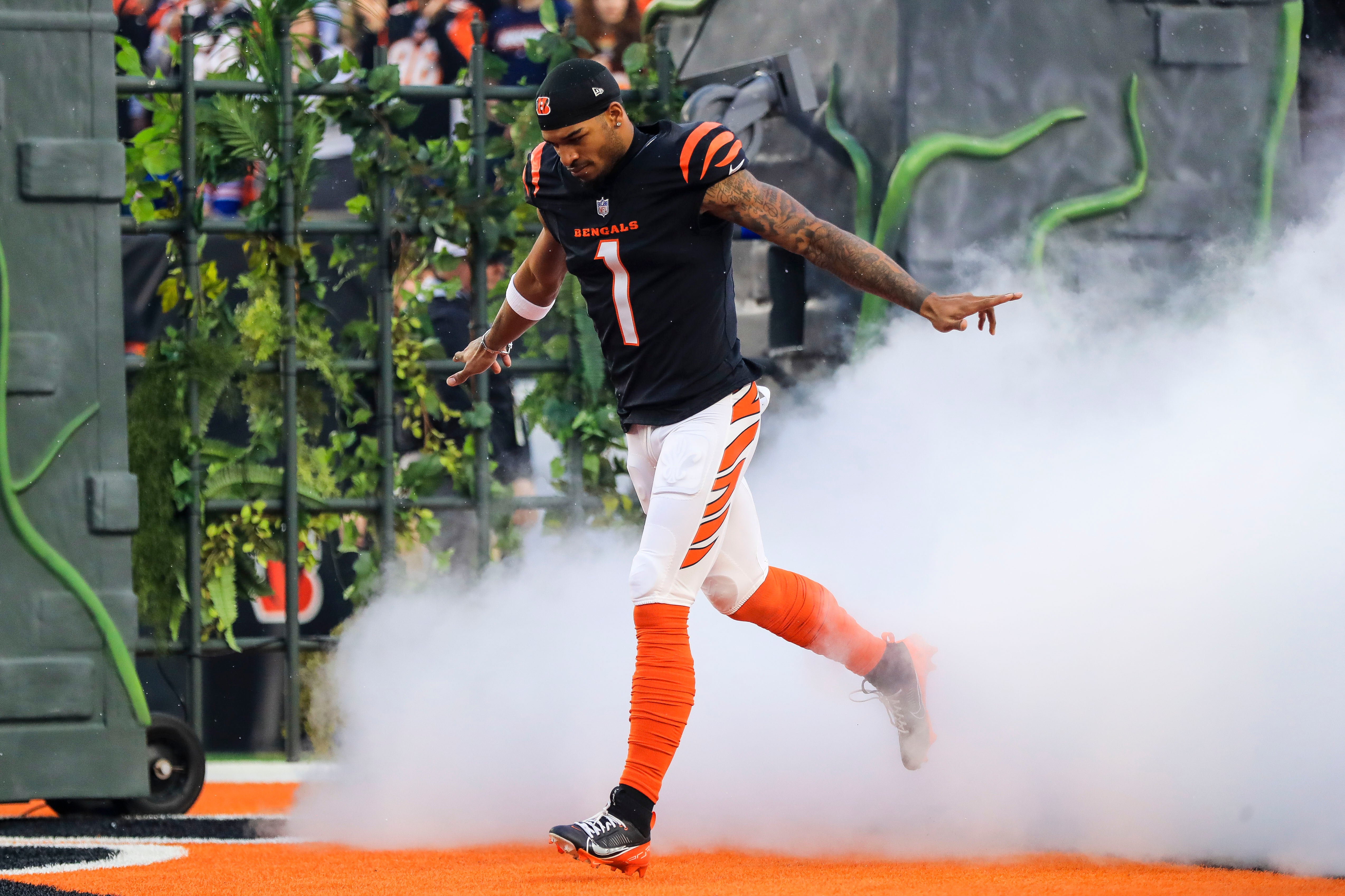 Dec 28, 2024; Cincinnati, Ohio, USA; Cincinnati Bengals wide receiver Ja'Marr Chase (1) runs onto the field before the game against the Denver Broncos at Paycor Stadium.