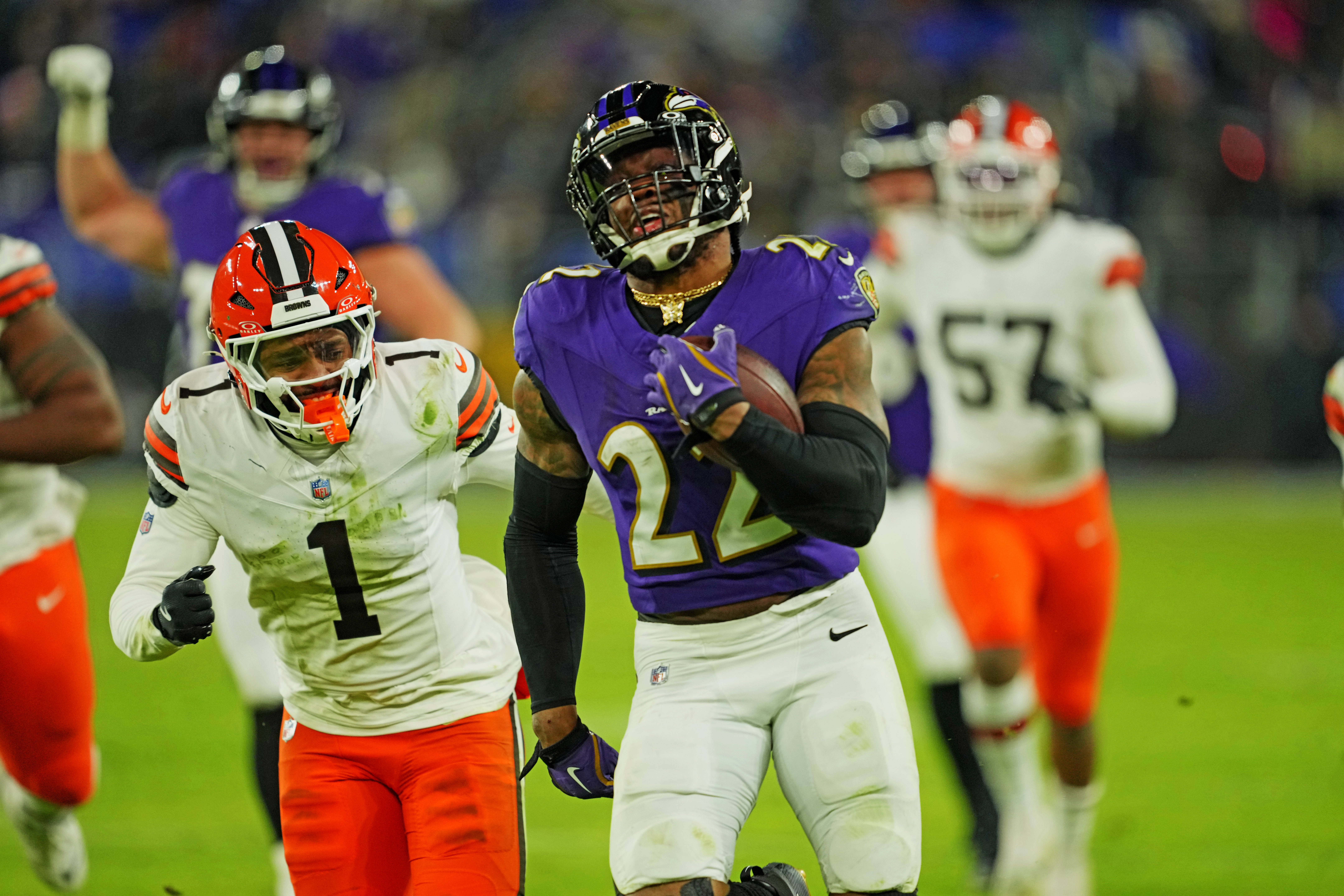 Jan 4, 2025; Baltimore, Maryland, USA; Baltimore Ravens running back Derrick Henry (22) runs for a touchdown during the fourth quarter against the Cleveland Browns at M&T Bank Stadium.