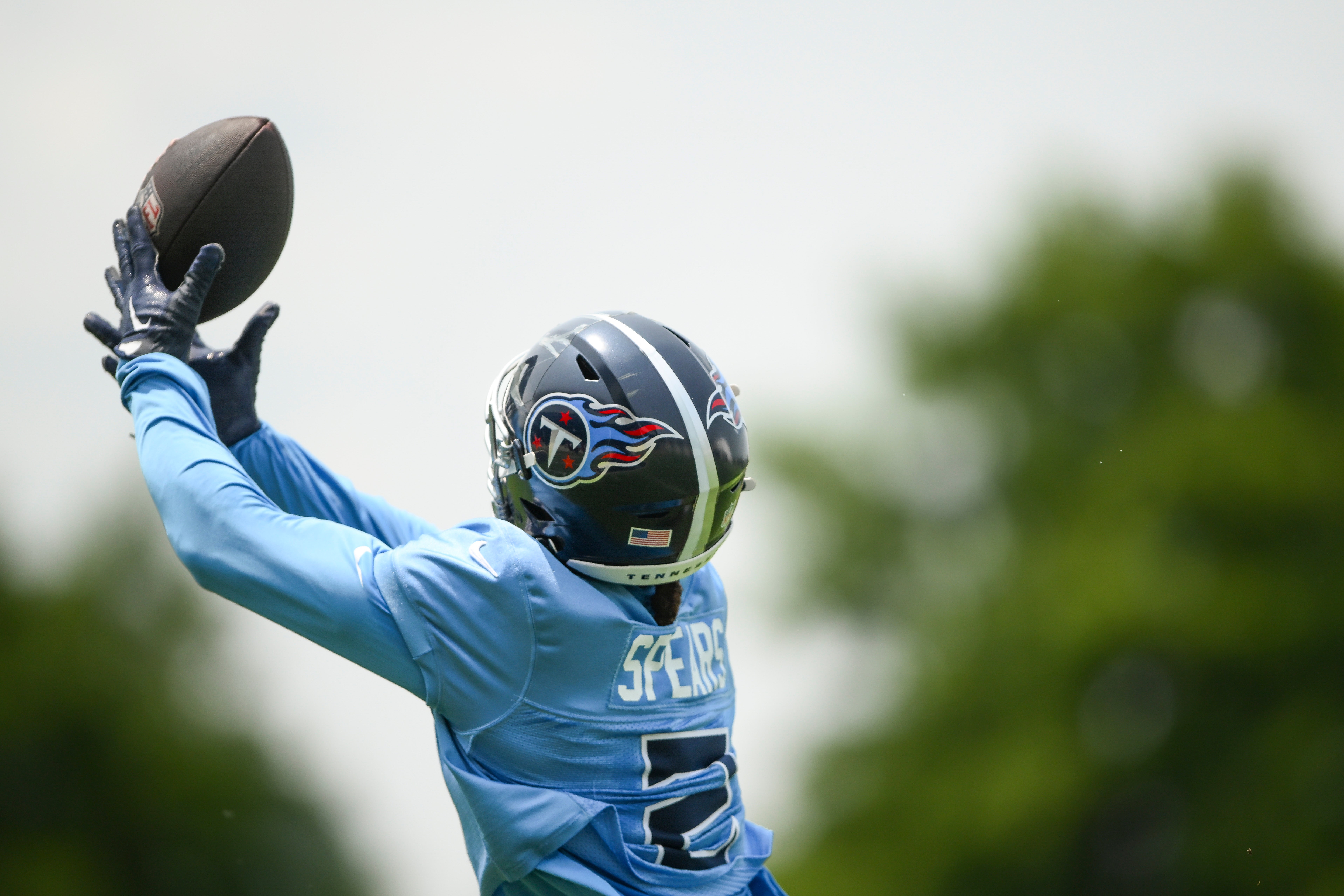 Jun 10, 2025; Nashville, TN, USA; Tennessee Titans running back Tyjae Spears (2) makes a catch during minicamp at Nissan Stadium. Mandatory Credit: Steve Roberts-Imagn Images