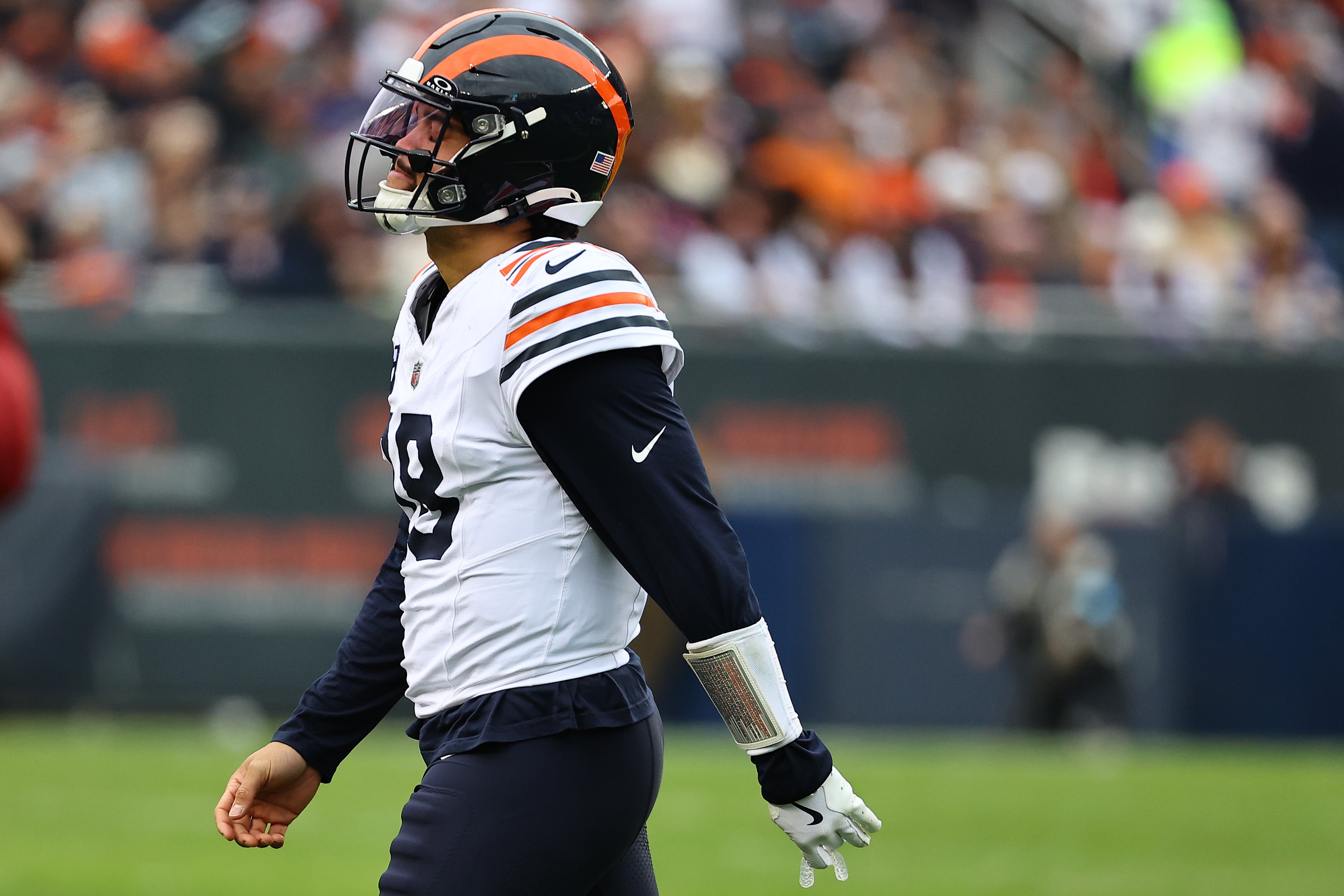 Nov 24, 2024; Chicago, Illinois, USA; Chicago Bears quarterback Caleb Williams (18) reacts after a play against the Minnesota Vikings during the second half at Soldier Field.