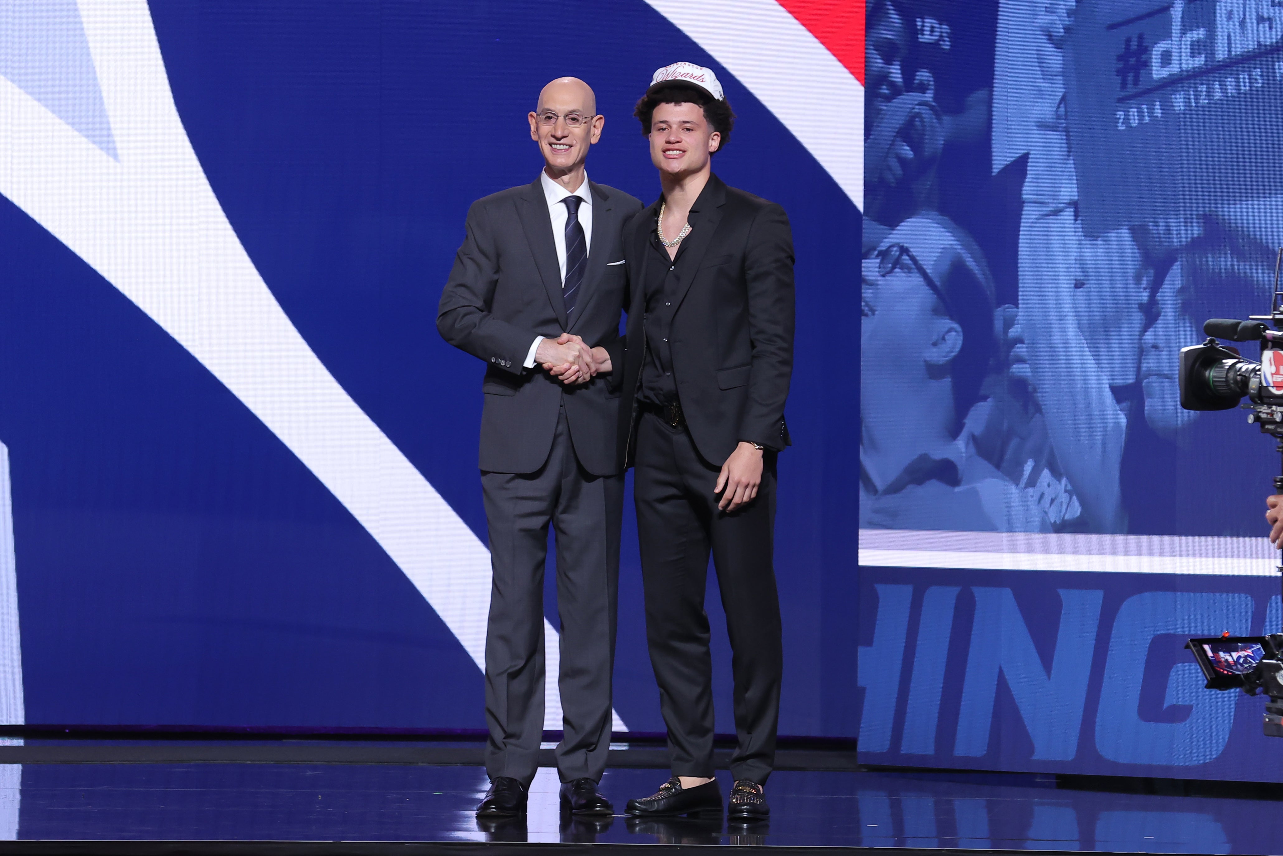 Jun 25, 2025; Brooklyn, NY, USA; Walter Clayton Jr. stands with NBA commissioner Adam Silver after being selected as the 18th pick by the Washington Wizards in the first round of the 2025 NBA Draft at Barclays Center.