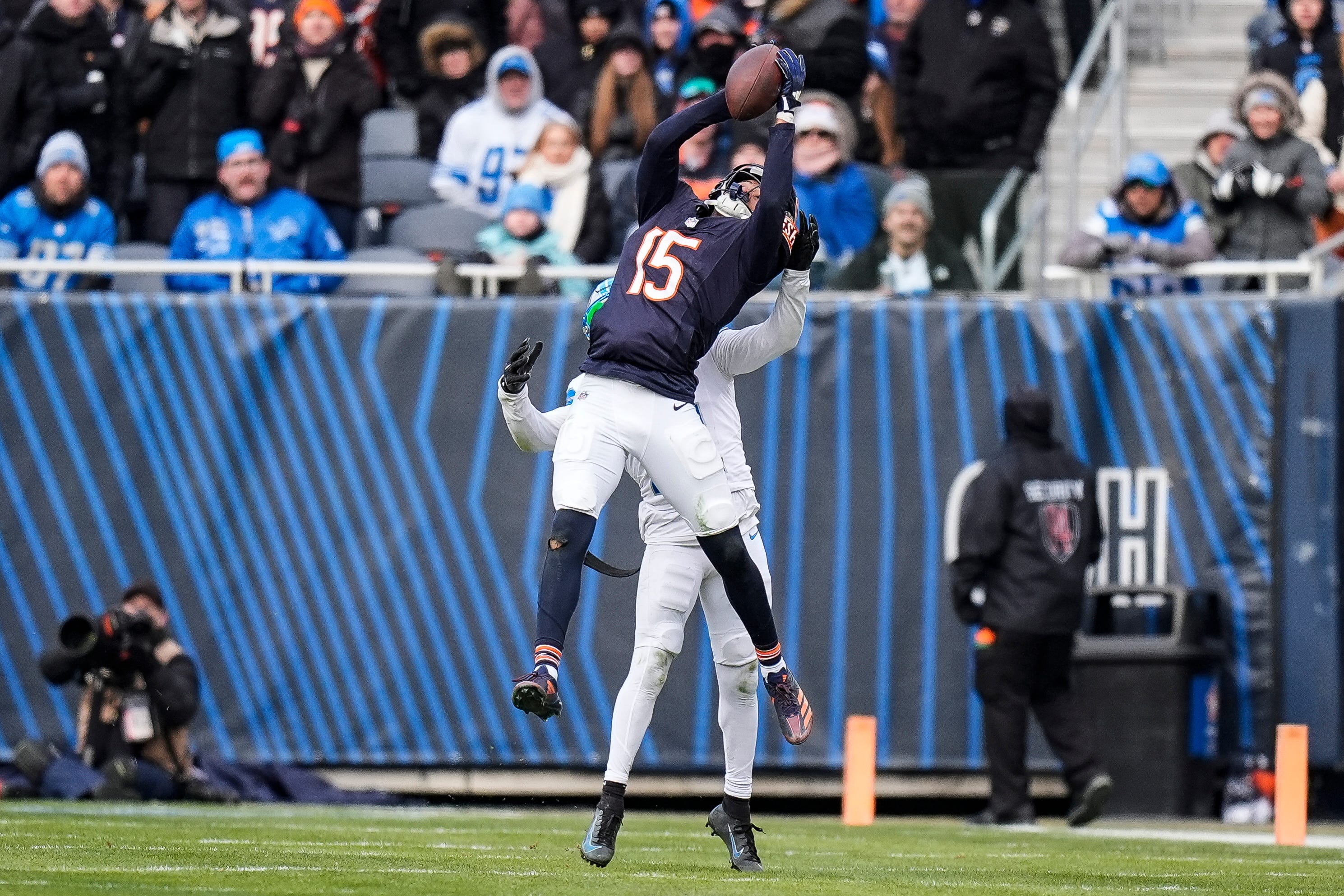 Chicago Bears wide receiver Rome Odunze (15) makes a catch against Detroit Lions cornerback Amik Robertson (21) during the second half at Soldier Field in Chicago, Ill. on Sunday, Dec. 22, 2024.