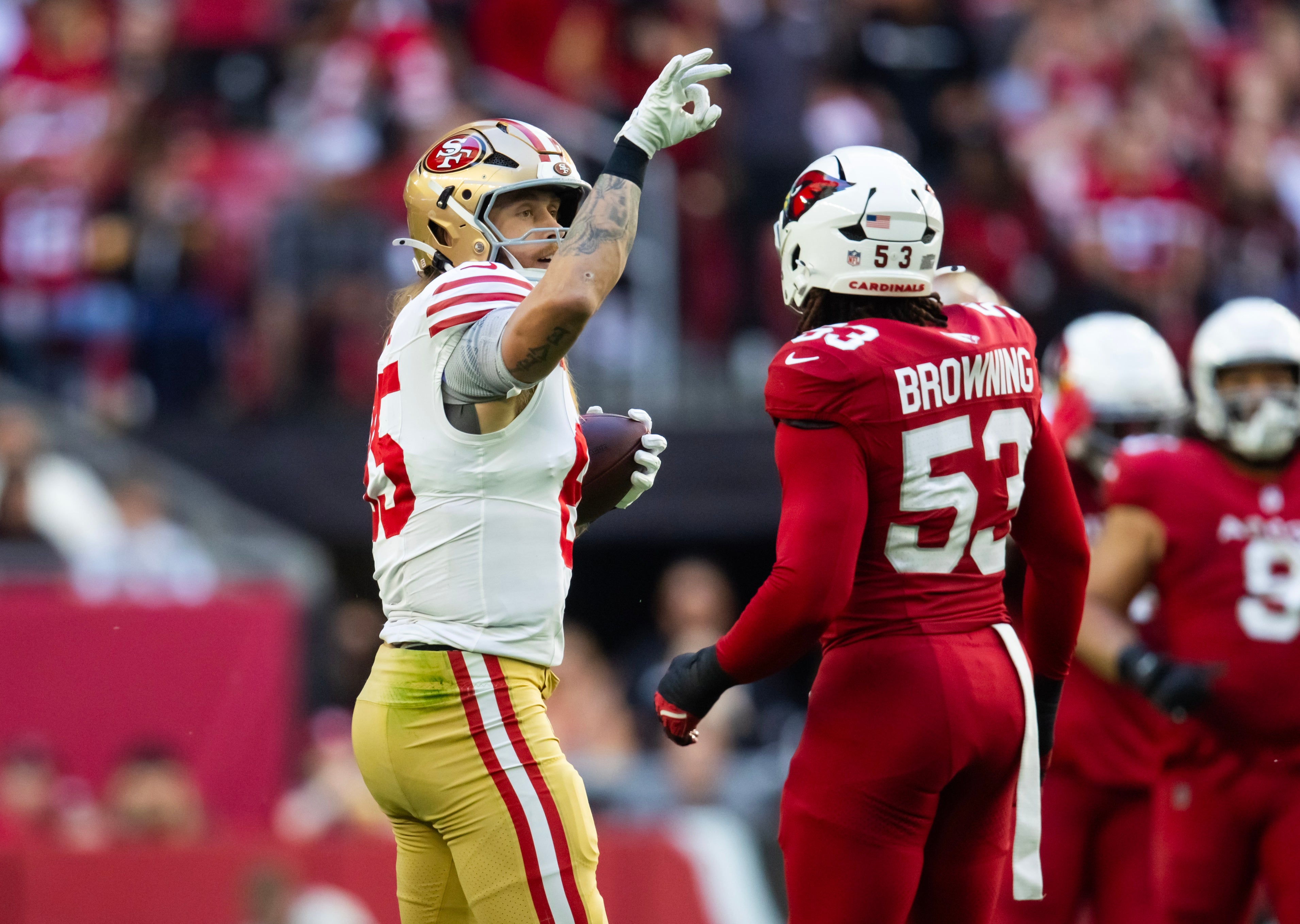 San Francisco 49ers tight end George Kittle (85) celebrates a catch against the Arizona Cardinals in the first half at State Farm Stadium.