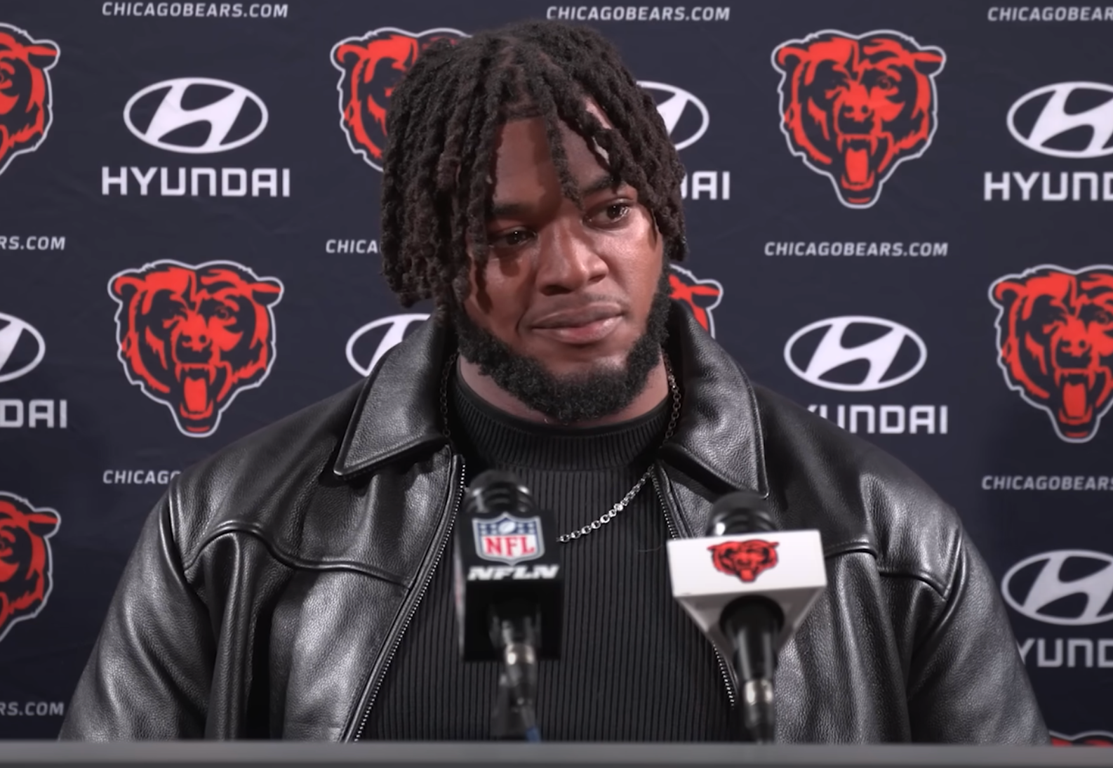 Dayo Odeyingbo speaks with reporters at Halas Hall.