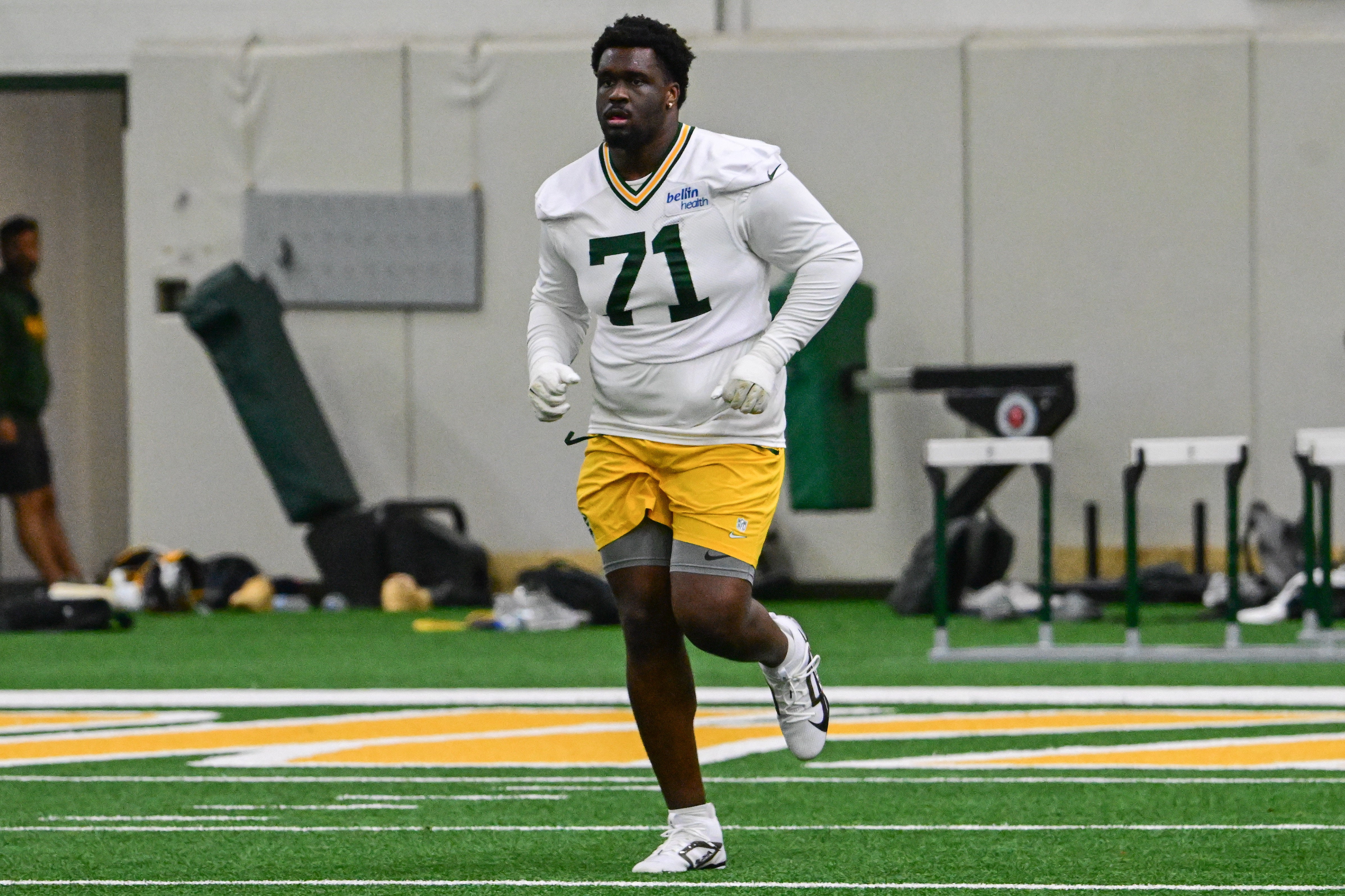 Green Bay Packers offensive tackle Anthony Belton (71) participates in the team's minicamp at Ray Nitschke Field.