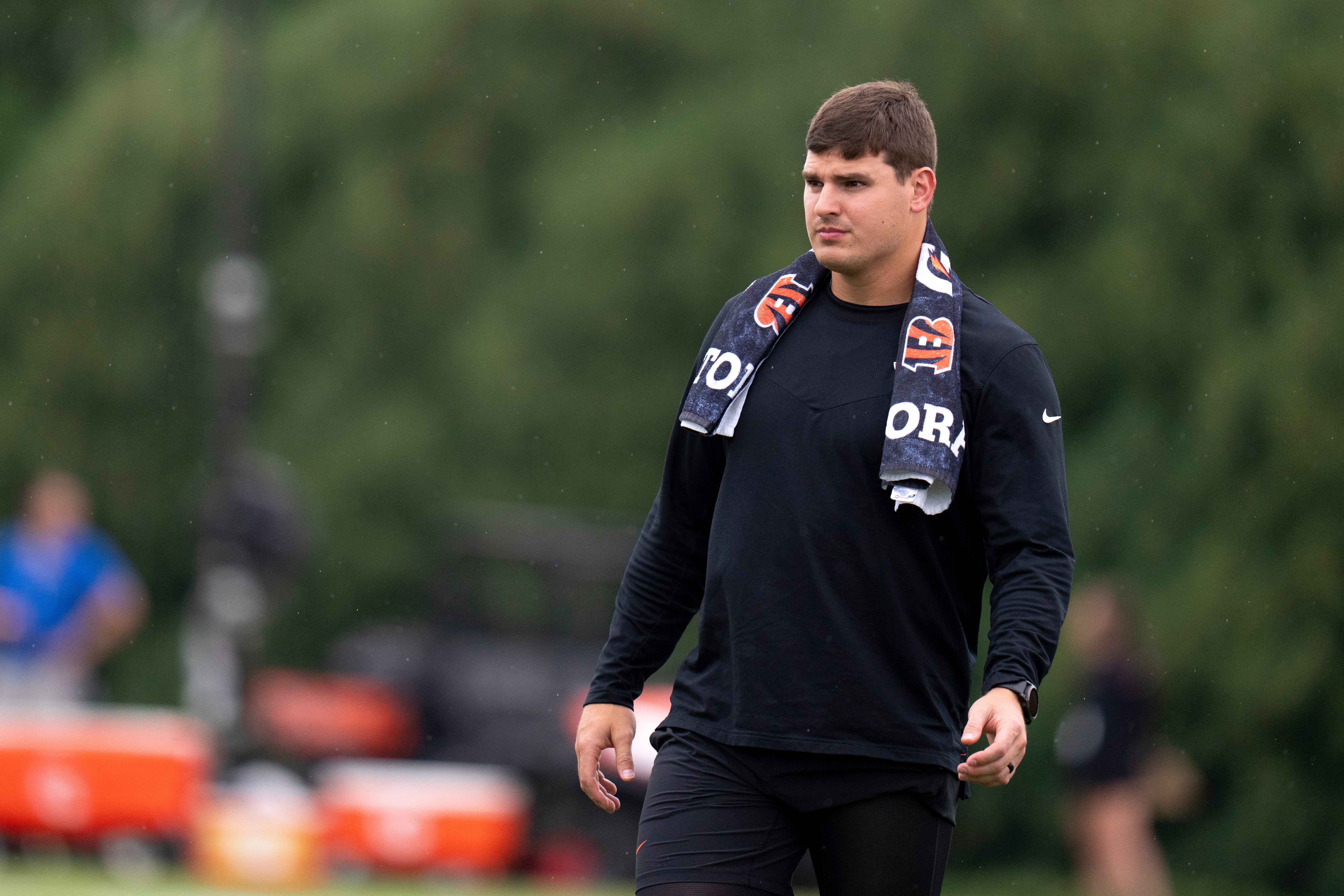 Cincinnati Bengals defensive end Trey Hendrickson (91) watches the defensive line run a drill at Cincinnati Bengals training camp on the Kettering Health Practice Fields in Cincinnati on Sunday, July 28, 2024.