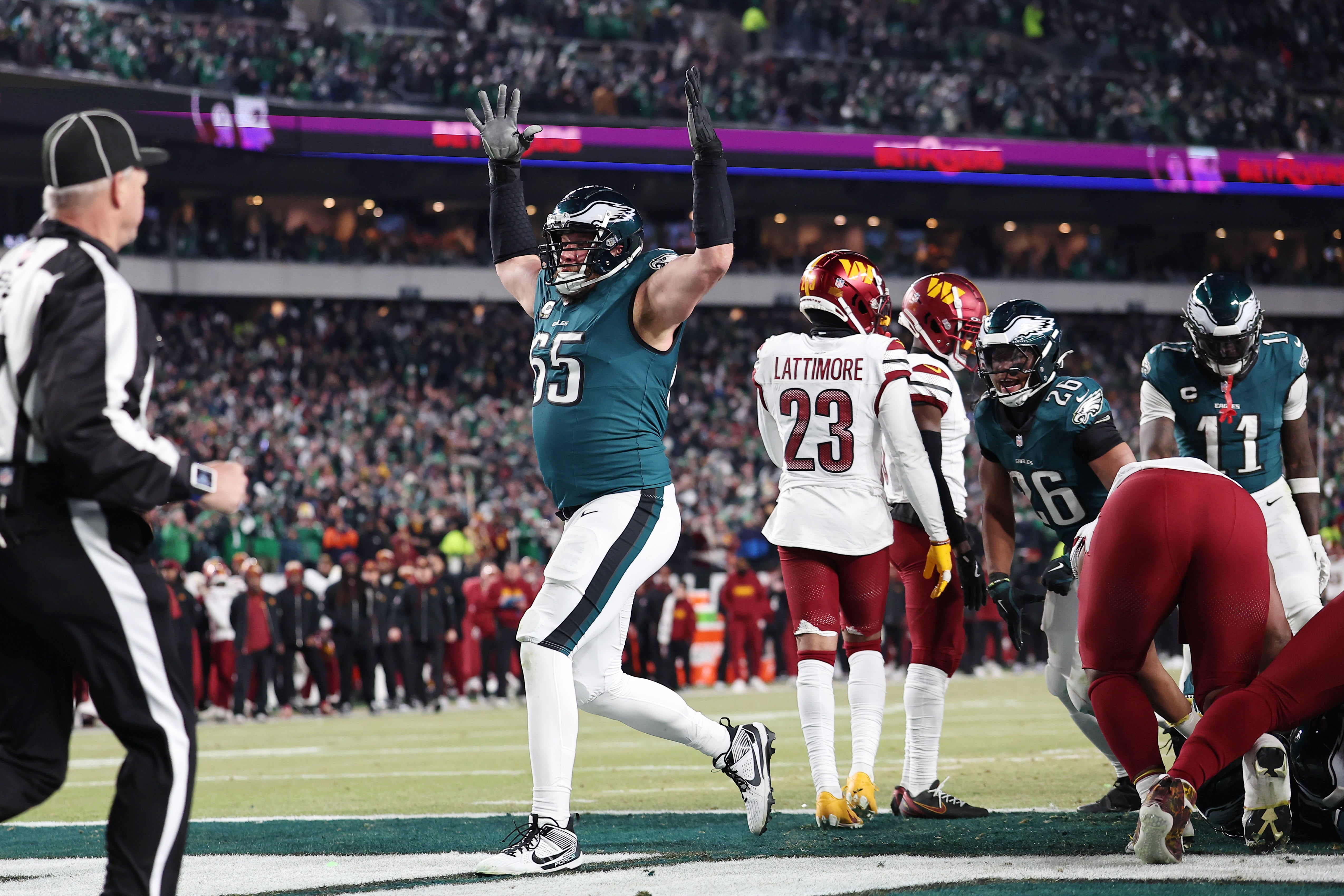 Jan 26, 2025; Philadelphia, PA, USA; Philadelphia Eagles offensive tackle Lane Johnson (65) celebrates a touchdown against the Washington Commanders during the second half in the NFC Championship game at Lincoln Financial Field.
